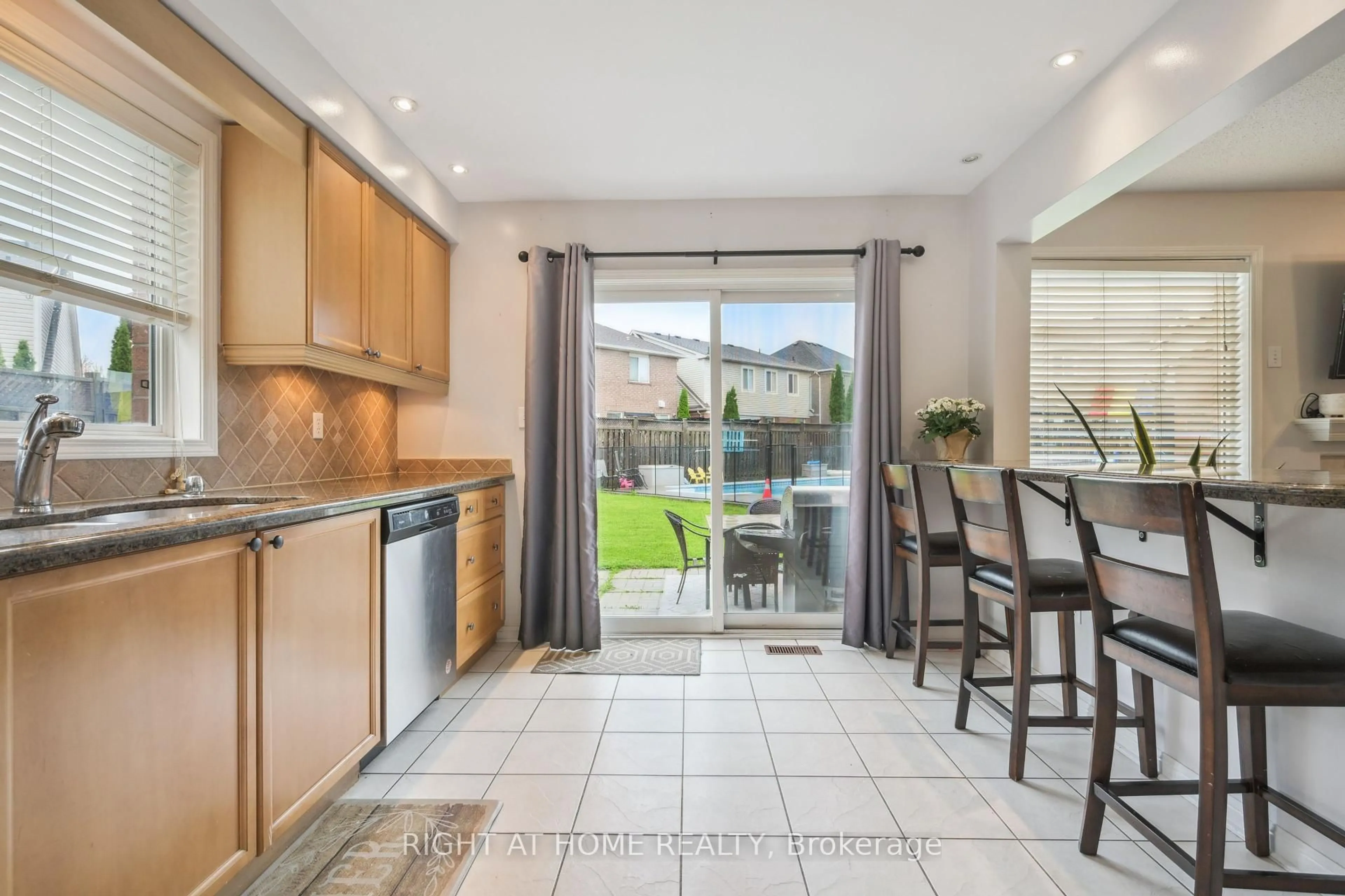 Open concept kitchen, ceramic/tile floor for 477 Farlow Cres, Milton Ontario L9T 5M8