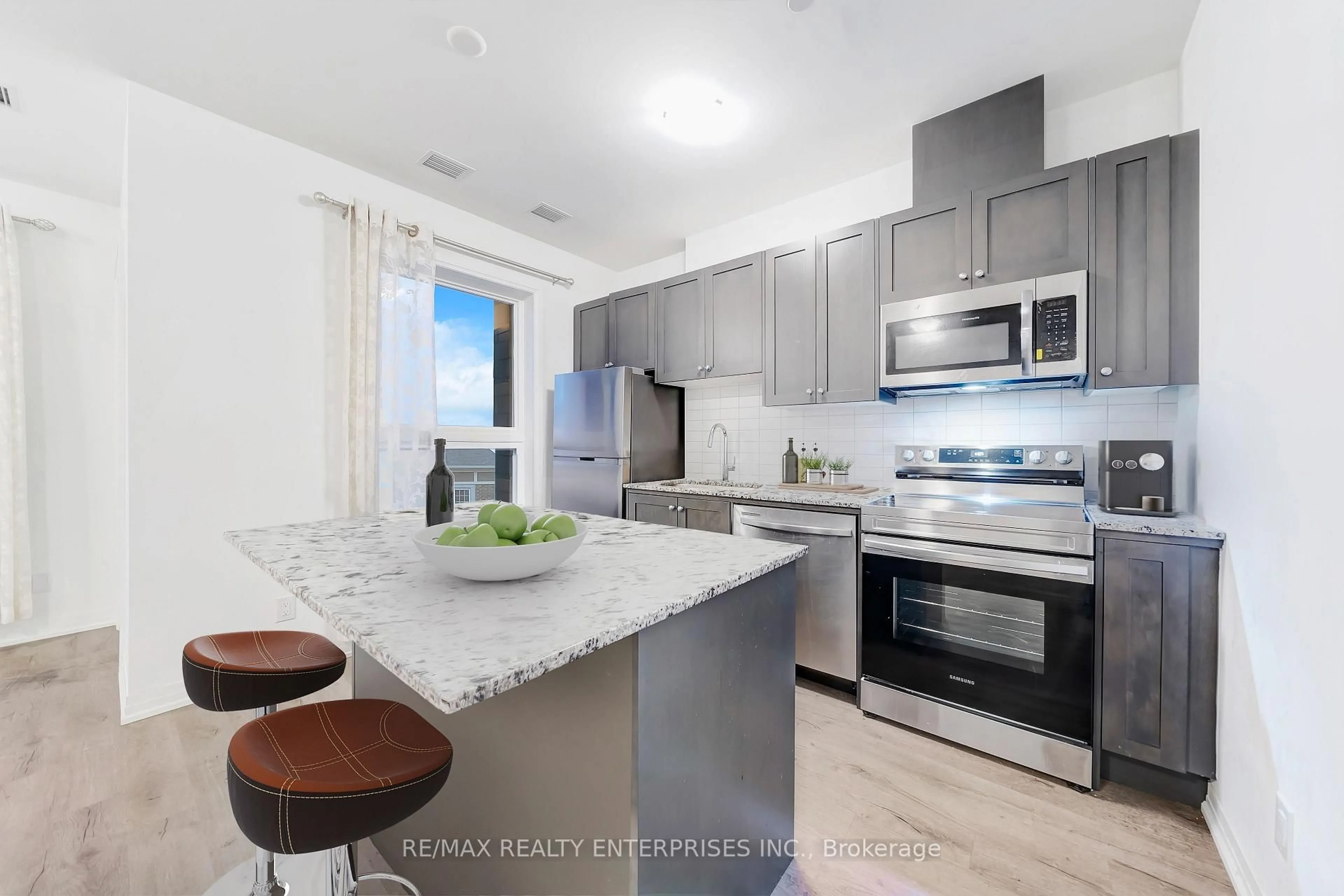 Open concept kitchen, unknown for 3285 Carding Mill Tr #202, Oakville Ontario L6M 0X3