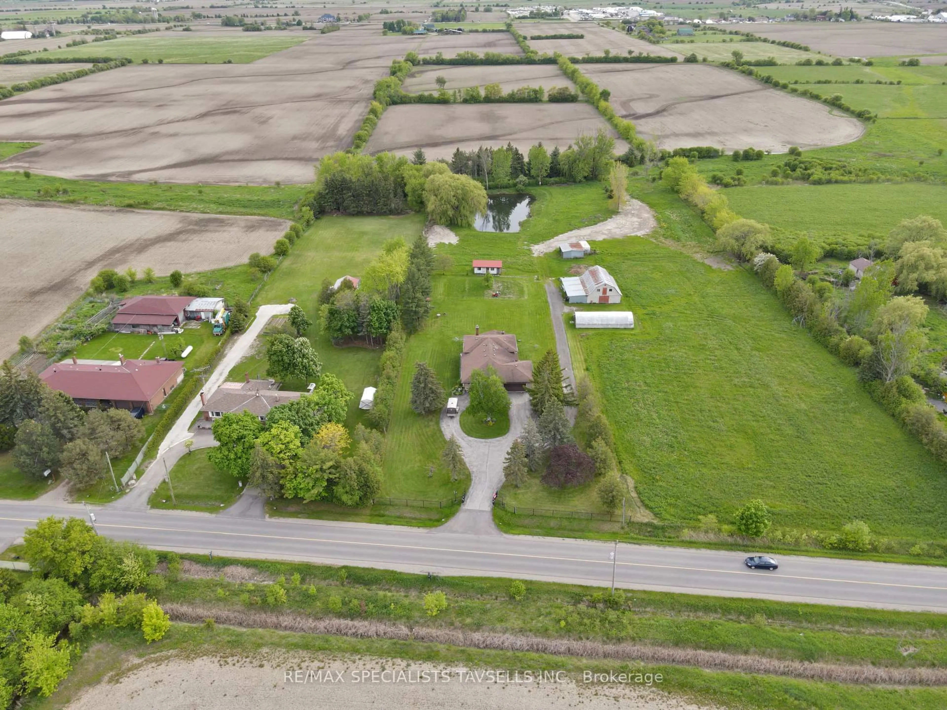 A pic from outside/outdoor area/front of a property/back of a property/a pic from drone, street for 13724 Innis Lake Rd, Caledon Ontario L7C 2Y6