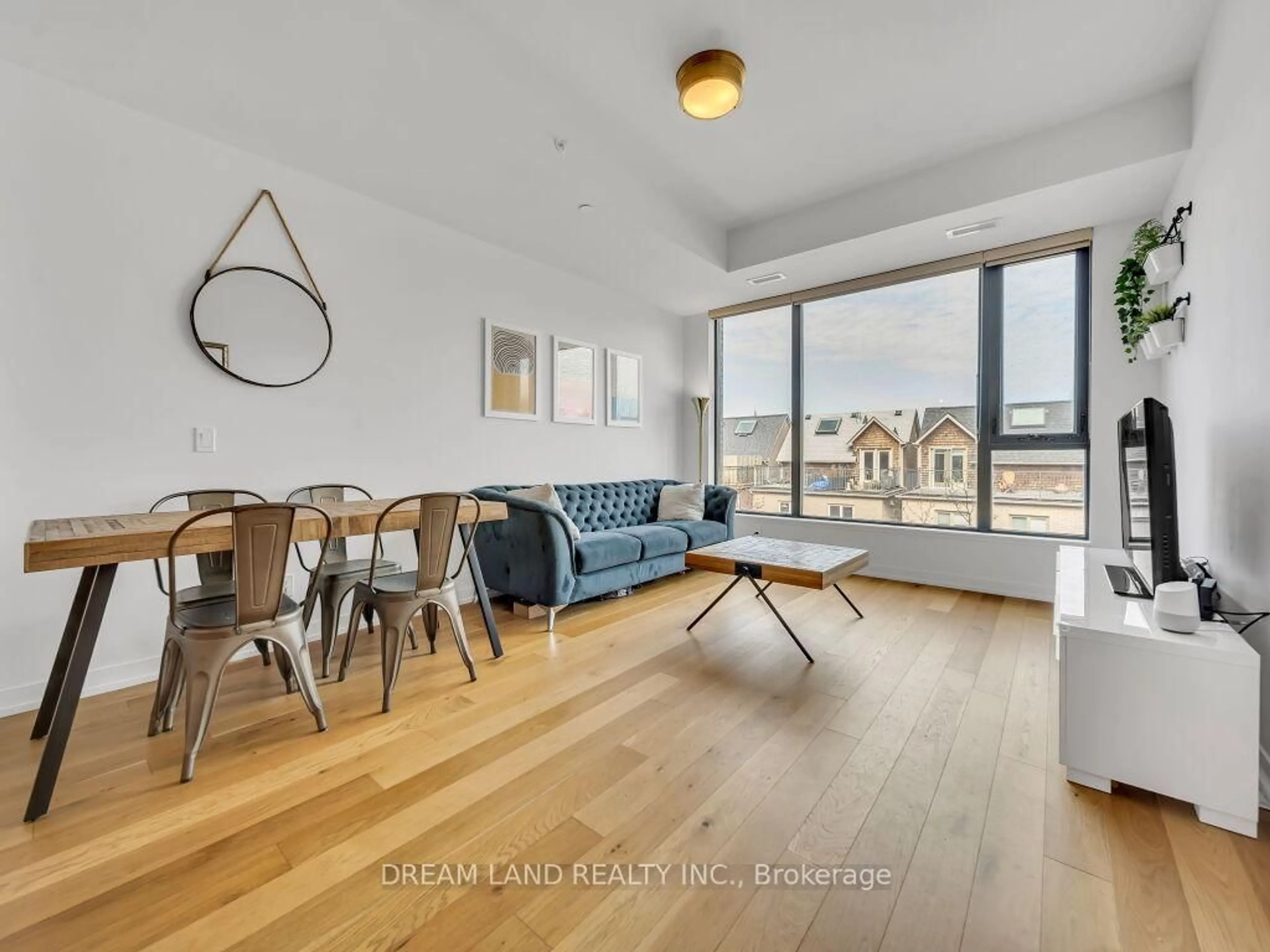 Living room with furniture, wood/laminate floor for 35 Wabash Ave #314, Toronto Ontario M6R 0A9