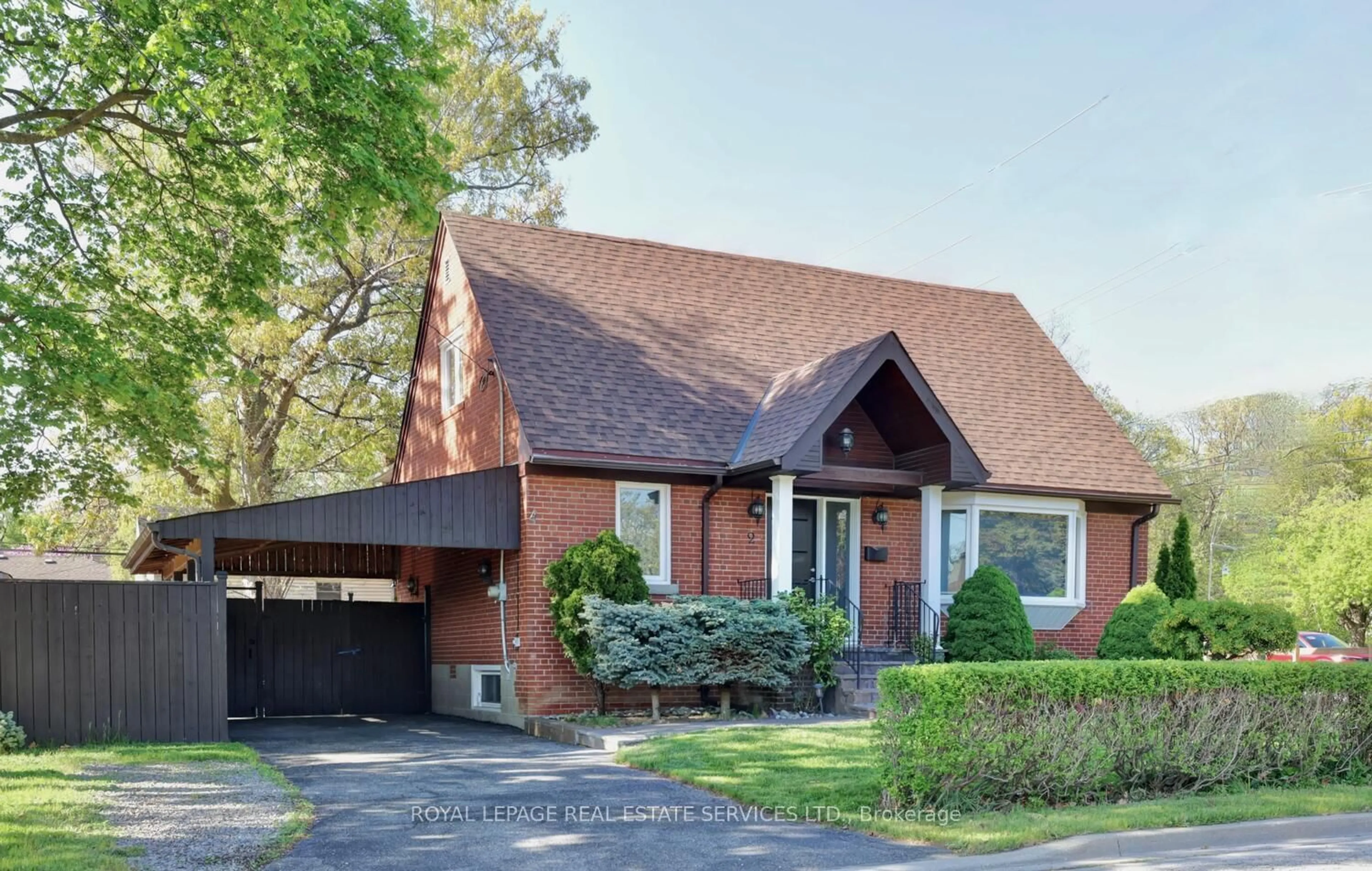 Home with brick exterior material, street for 2 North Heights Rd, Toronto Ontario M9B 2T1
