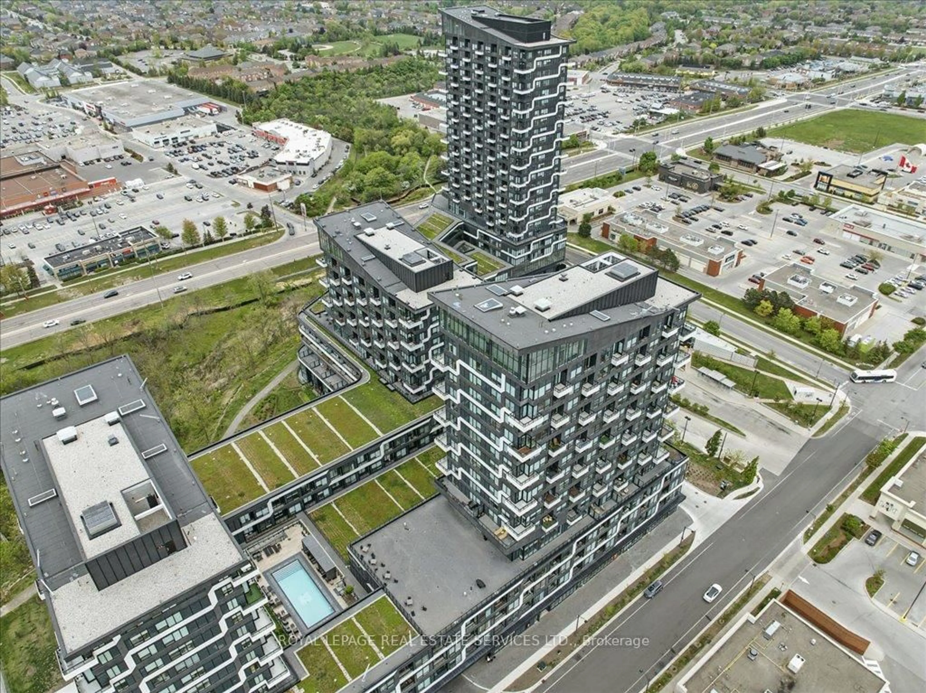 A pic from outside/outdoor area/front of a property/back of a property/a pic from drone, city buildings view from balcony for 2489 Taunton Rd #108, Oakville Ontario L6H 3R9
