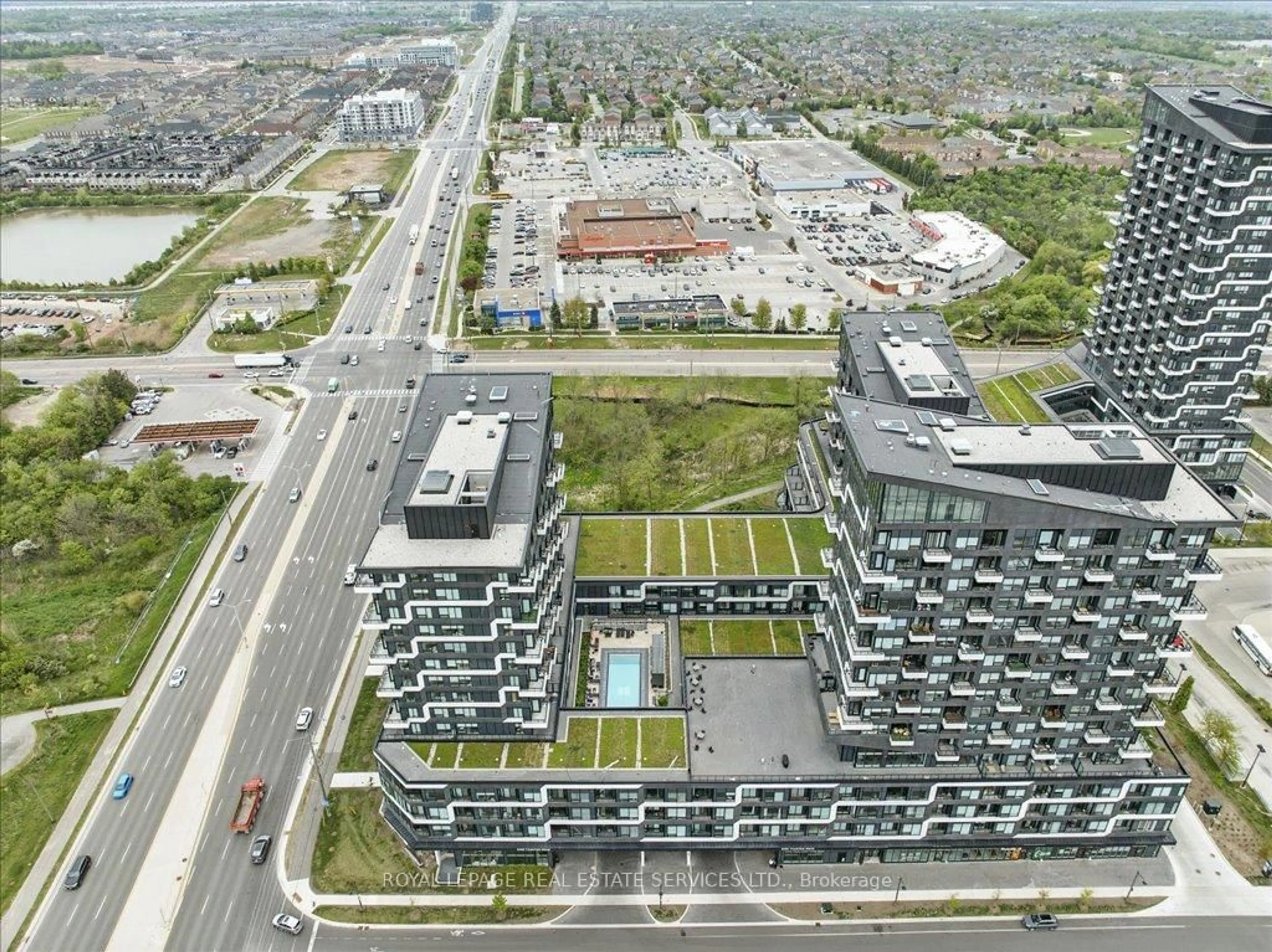 A pic from outside/outdoor area/front of a property/back of a property/a pic from drone, unknown for 2489 Taunton Rd #108, Oakville Ontario L6H 3R9