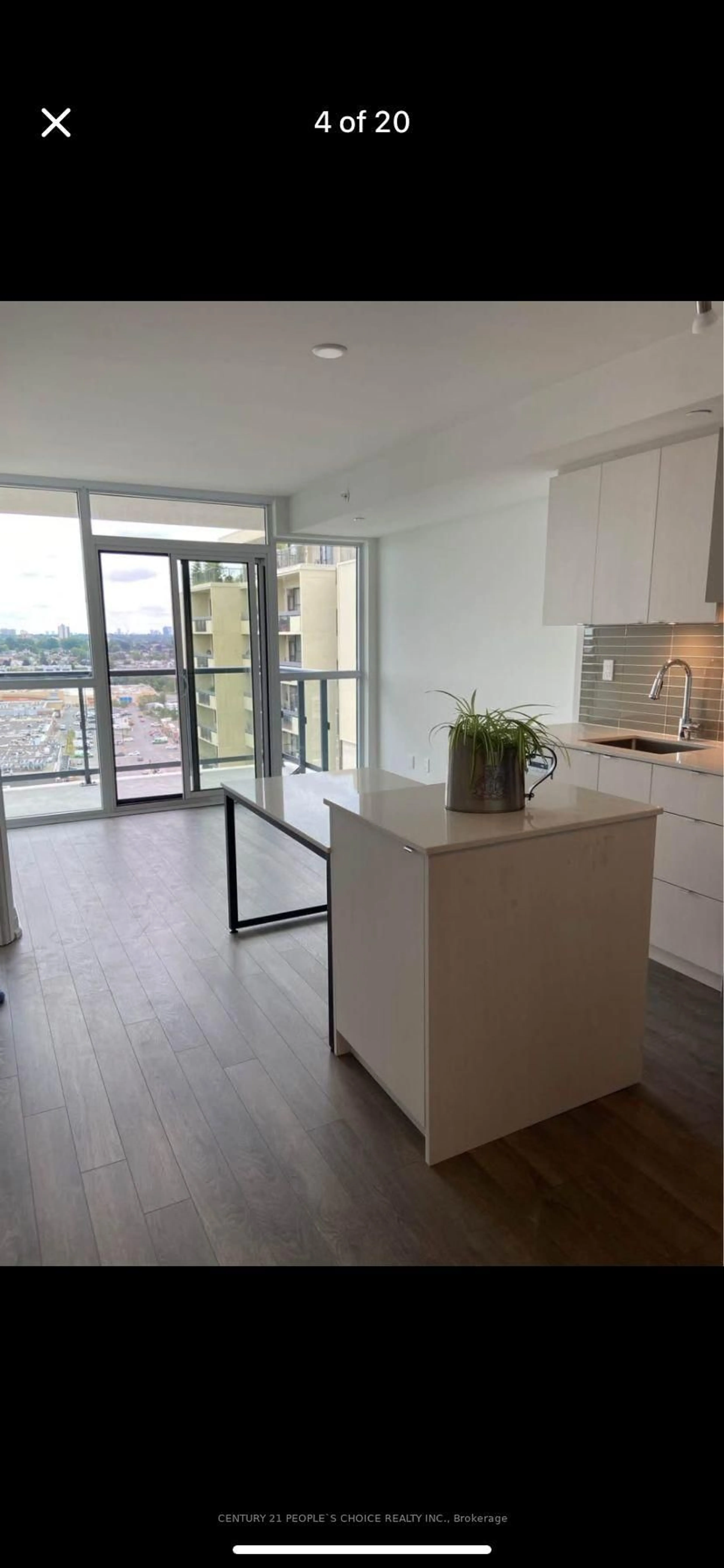 Open concept kitchen, wood/laminate floor for 1461 Lawrence Ave #1907, Toronto Ontario M6L 0A6