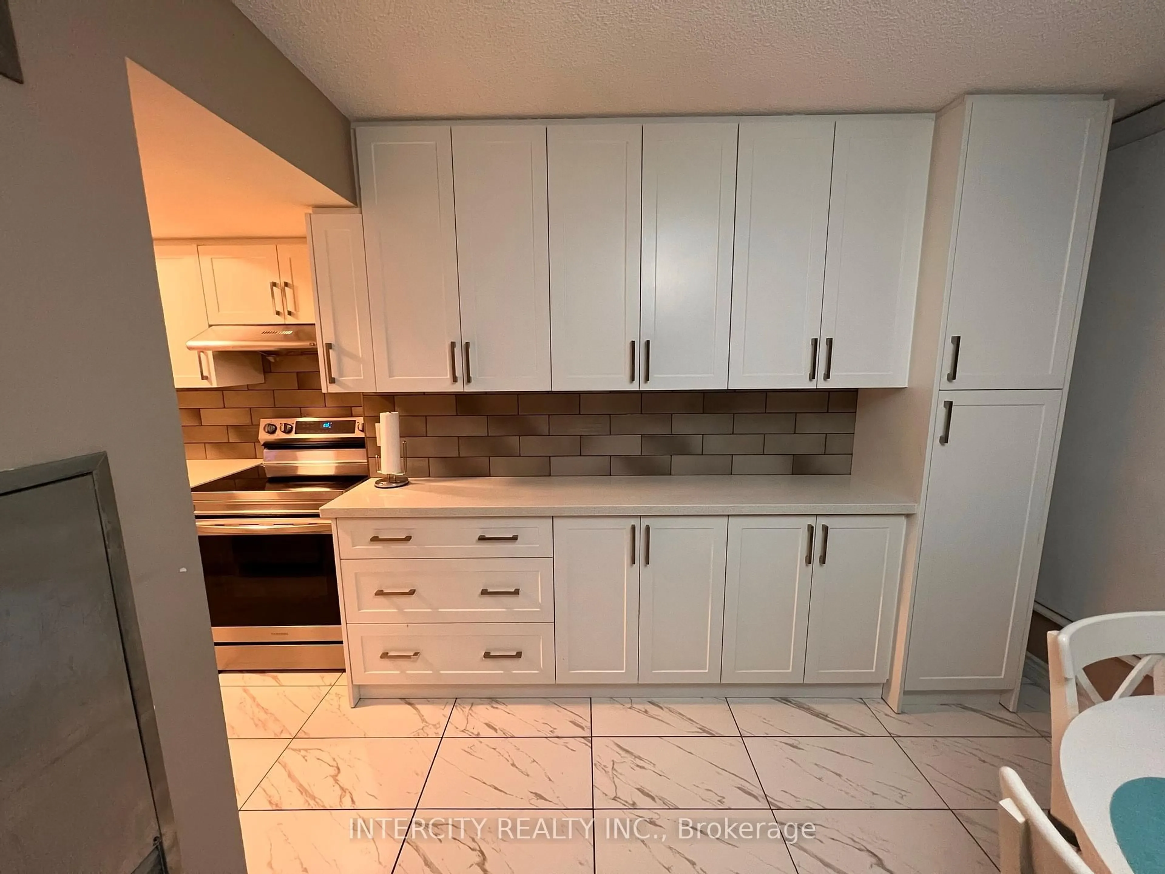 Standard kitchen, ceramic/tile floor for 1 Rowntree Rd #410, Toronto Ontario M9V 5G7