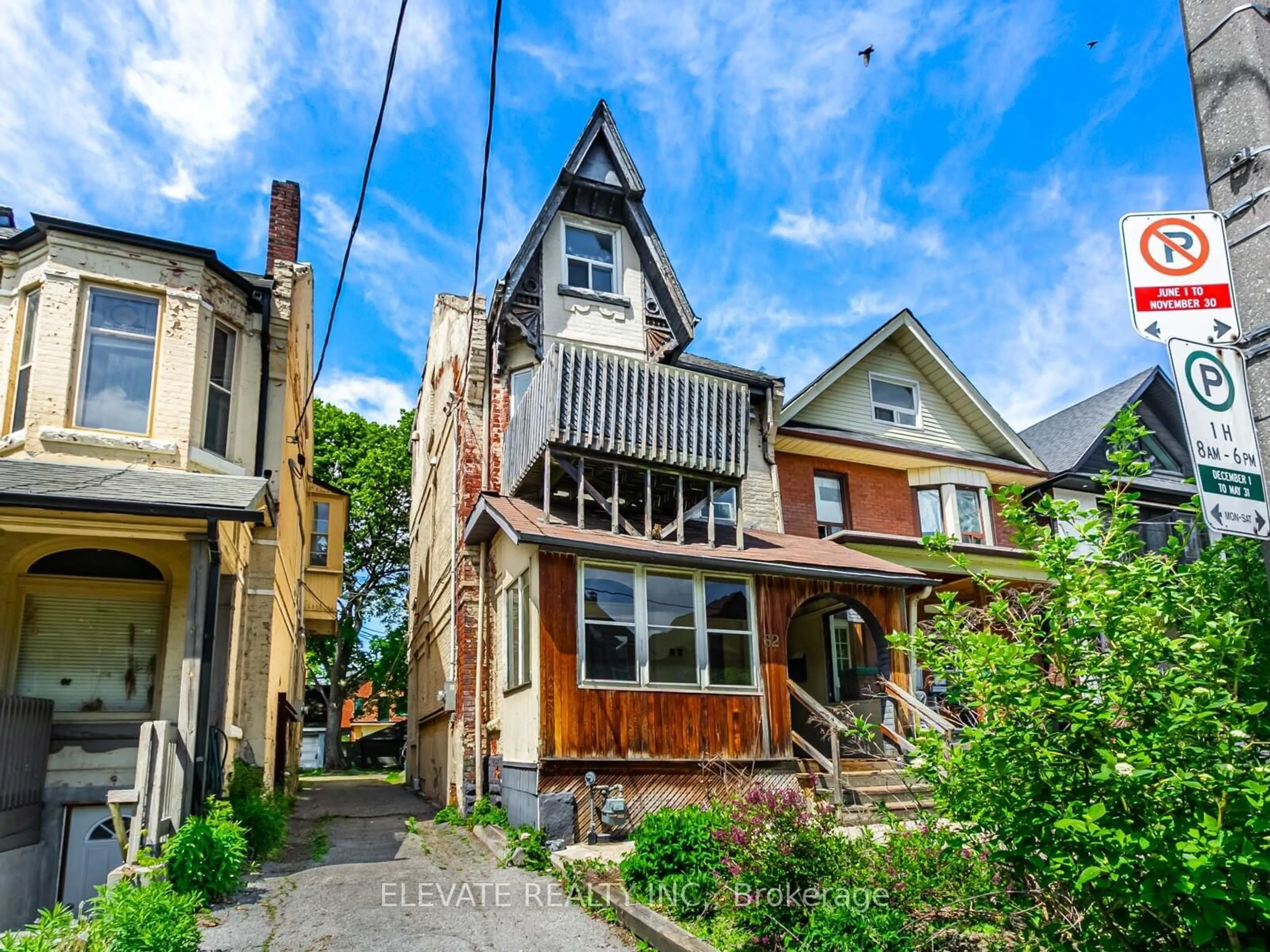 Home with brick exterior material, street for 62 Harvard Ave, Toronto Ontario M6R 1C6