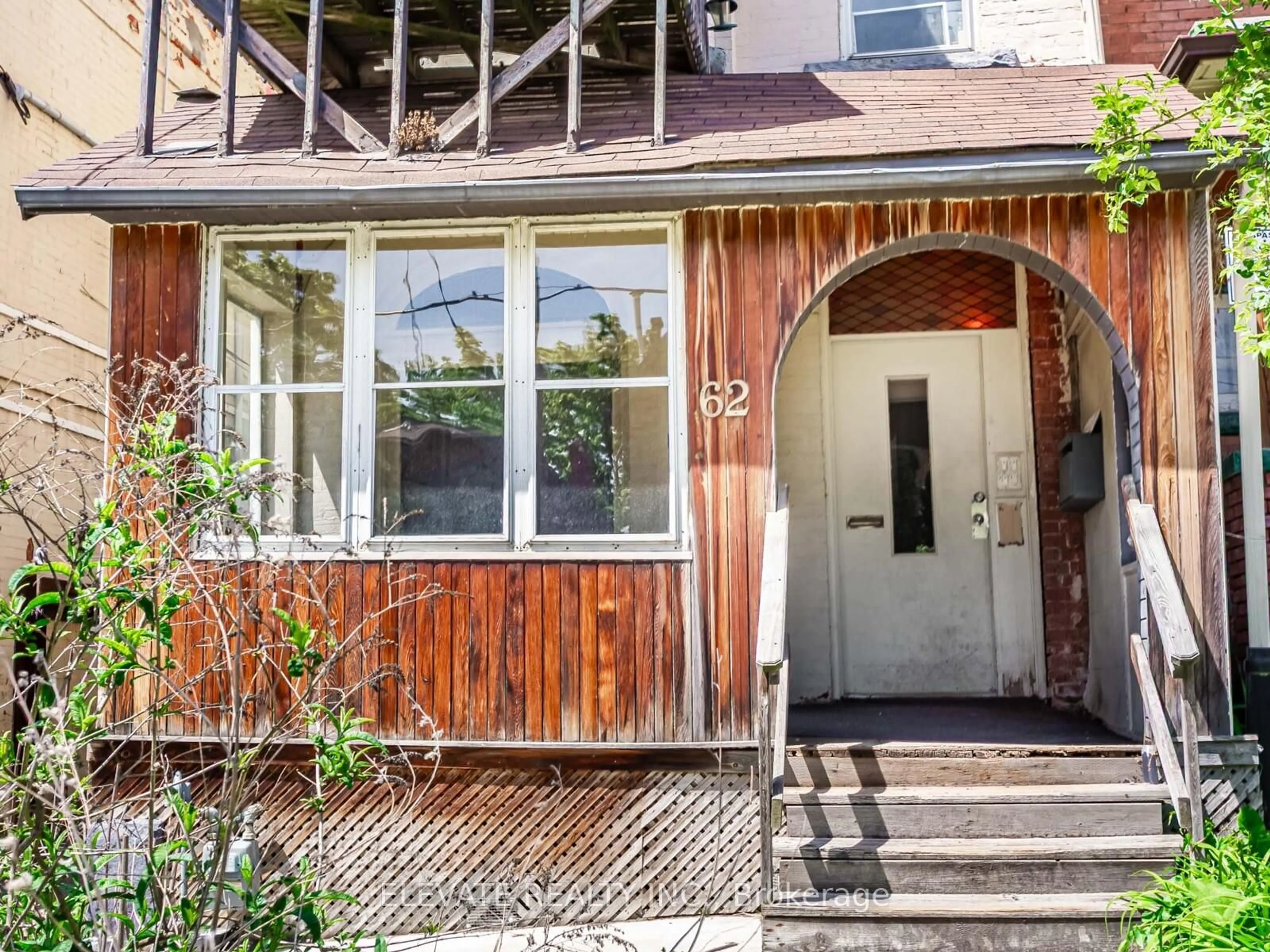 Home with brick exterior material, street for 62 Harvard Ave, Toronto Ontario M6R 1C6