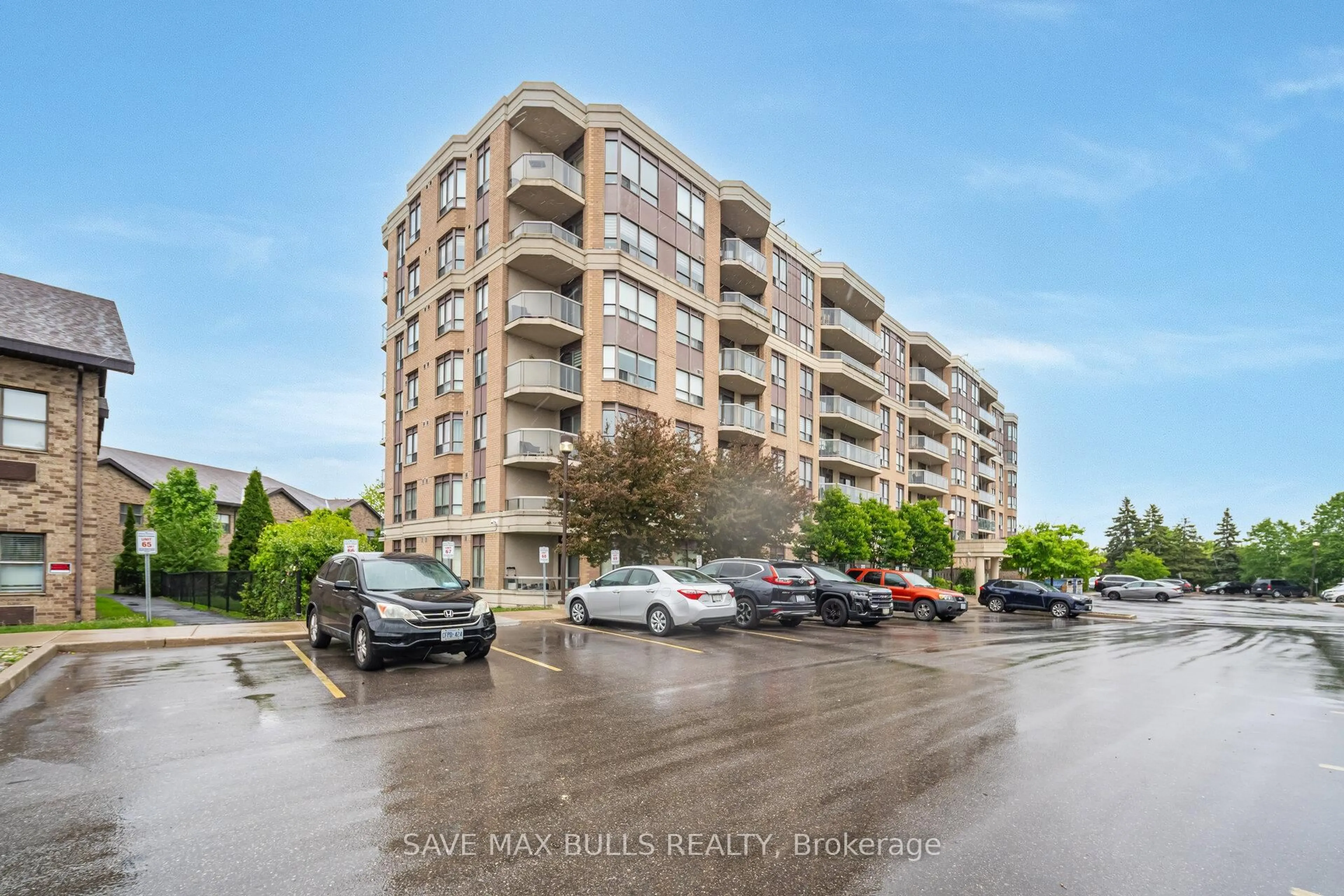 A pic from outside/outdoor area/front of a property/back of a property/a pic from drone, unknown for 300 Ray Lawson Blvd #303, Brampton Ontario L6Y 5H5