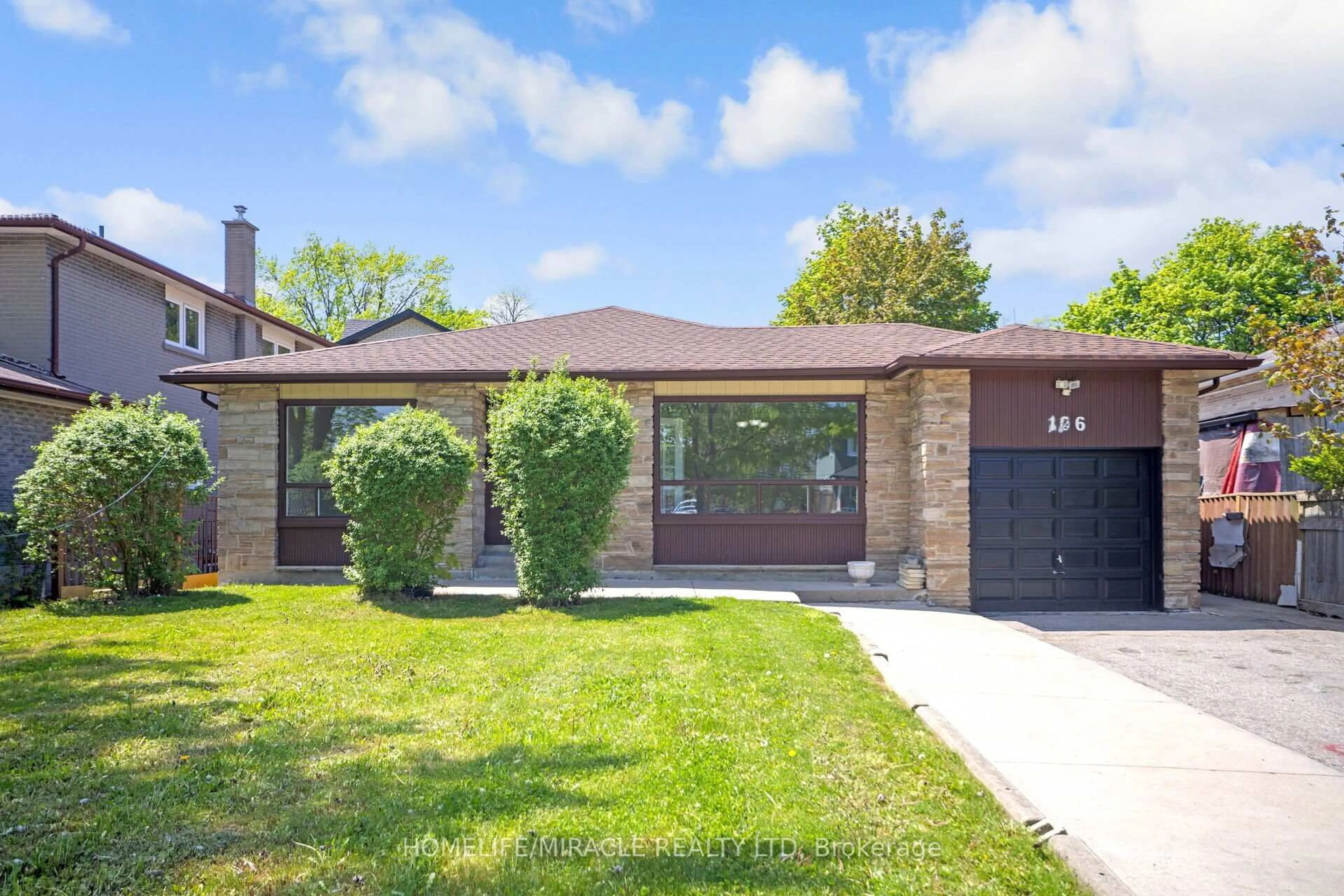 Home with brick exterior material, street for 106 Silverstone Dr, Toronto Ontario M9V 3G7