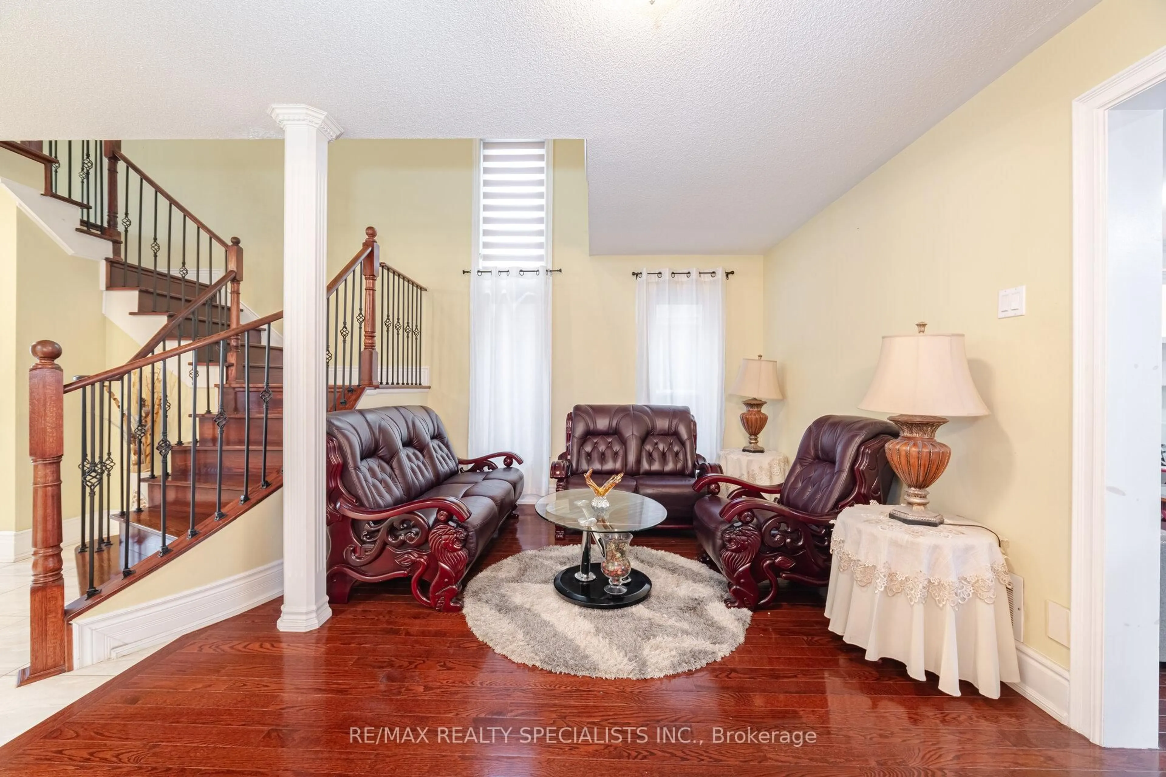Living room with furniture, ceramic/tile floor for 6 Chadwick St, Brampton Ontario L6Y 4Y6