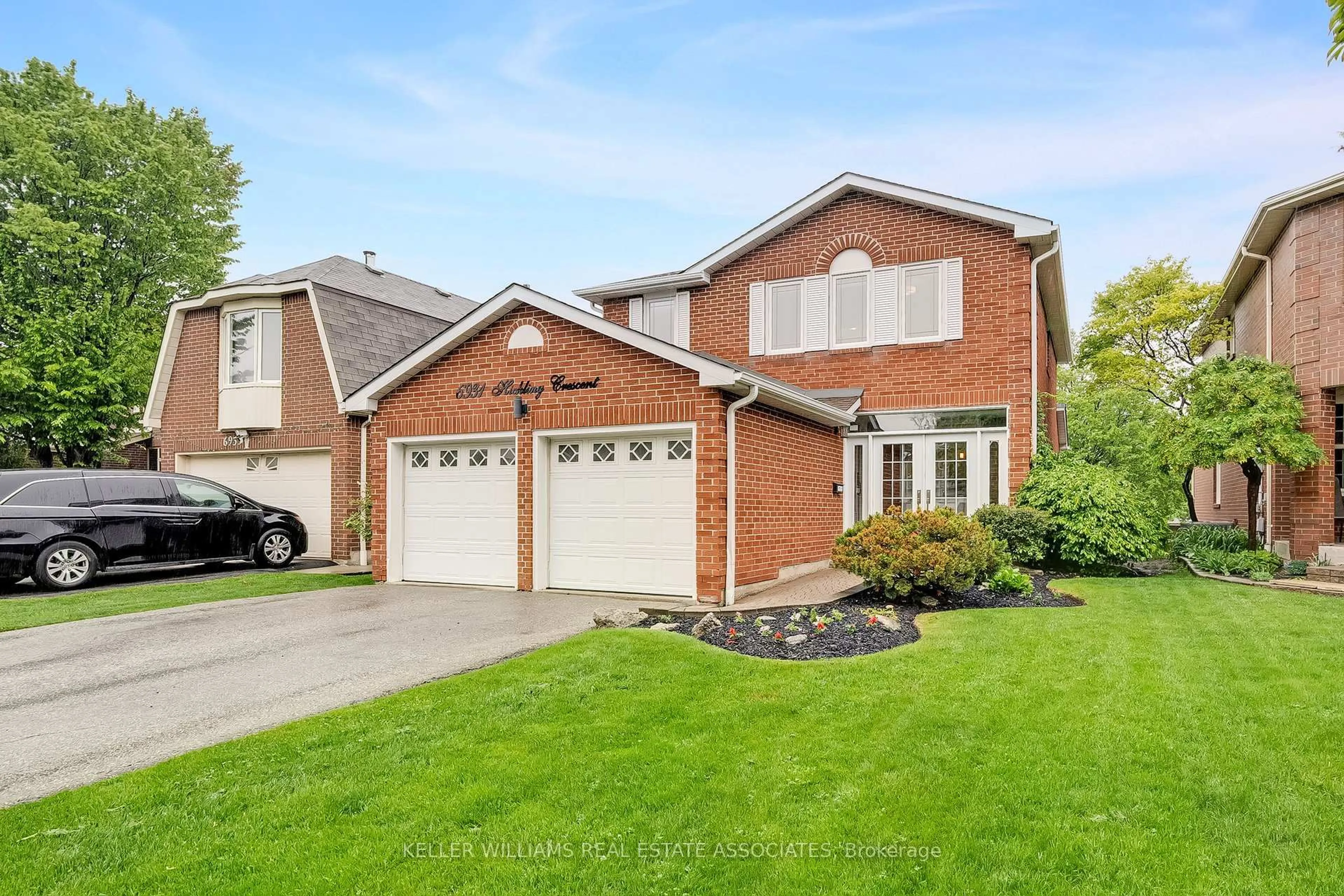 Home with brick exterior material, street for 6931 Hickling Cres, Mississauga Ontario L5N 5B1