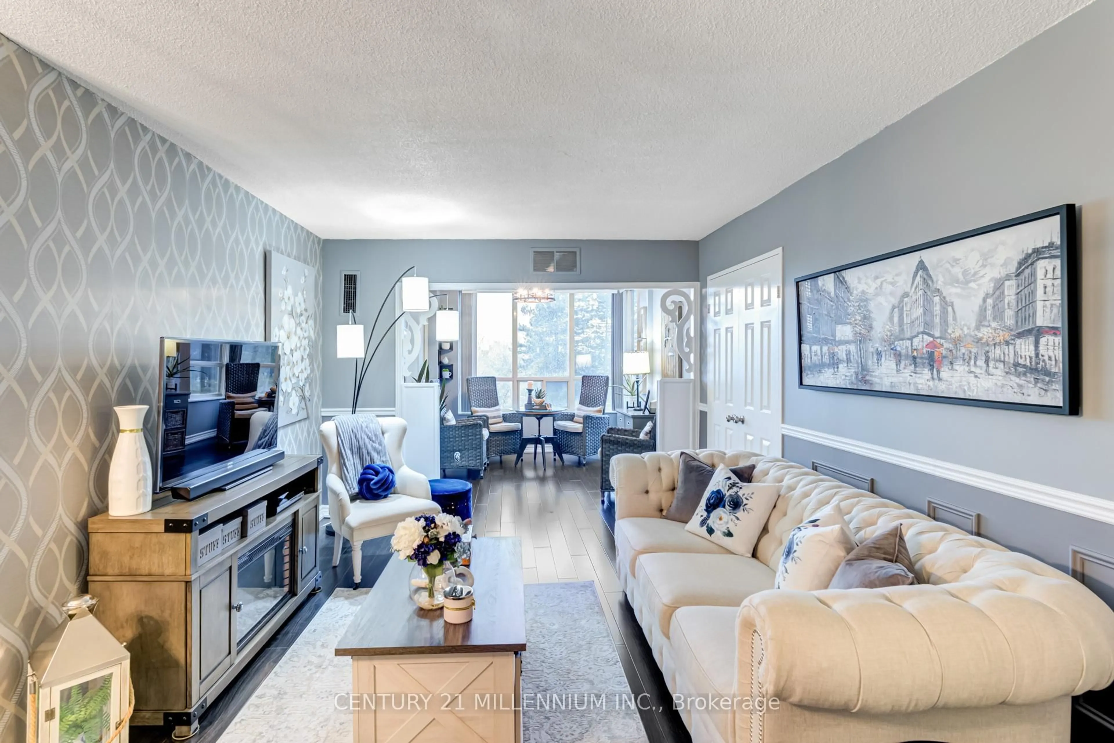 Living room with furniture, unknown for 20 Cherrytree Dr #305, Brampton Ontario L6Y 3V1