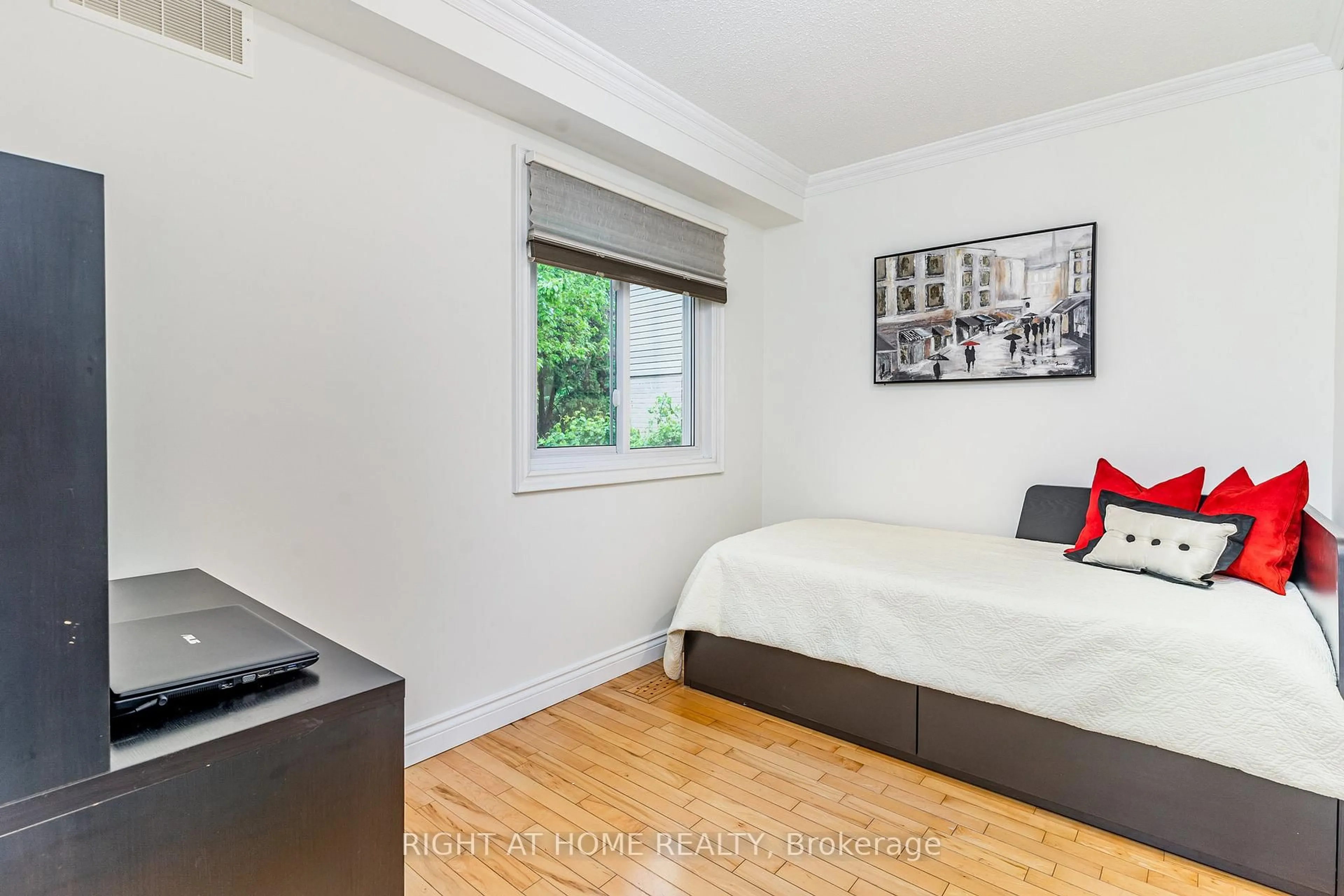 Bedroom with bed, wood/laminate floor for 6829 Markwood Pl, Mississauga Ontario L5N 4K7