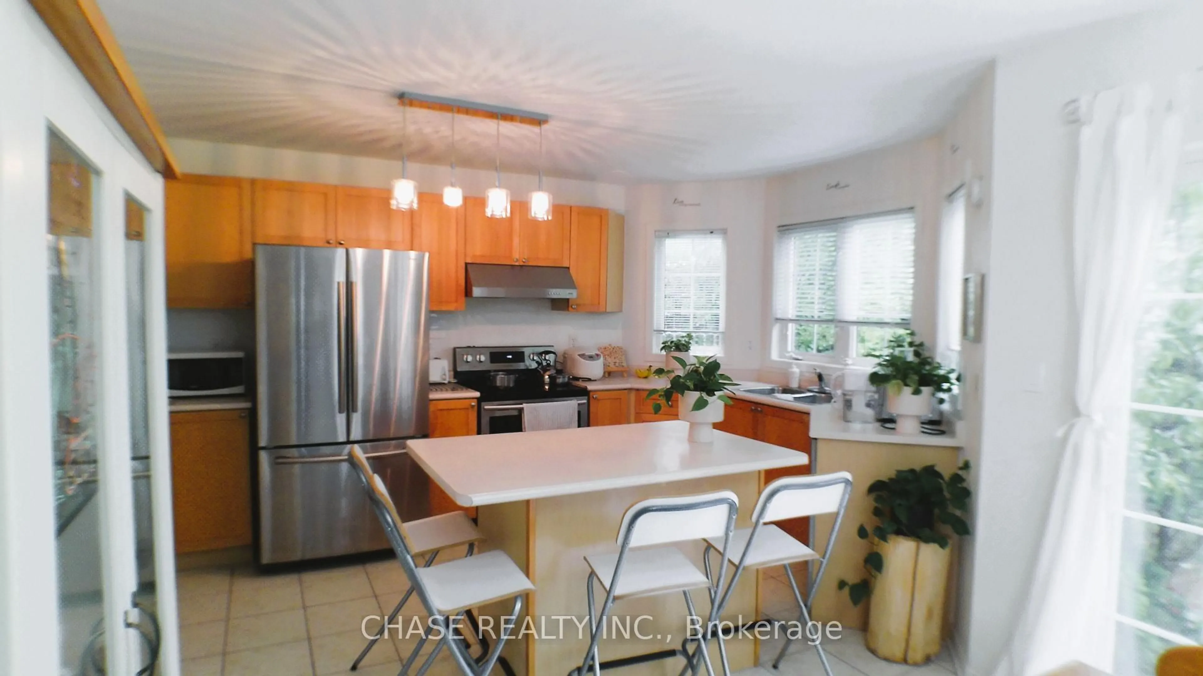 Open concept kitchen, unknown for 926 Stearn Pl, Milton Ontario L9T 6N3