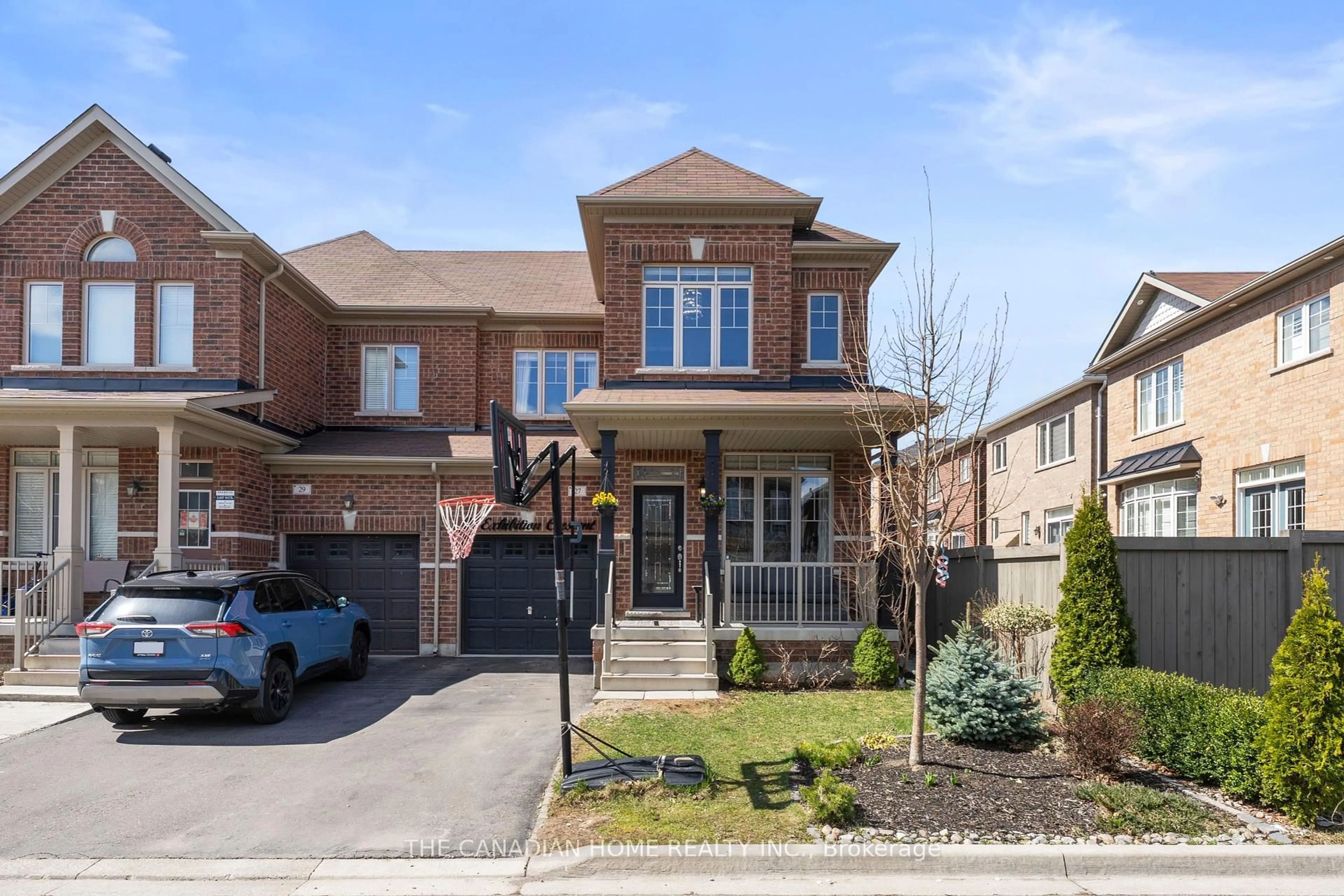 Home with brick exterior material, street for 27 Exhibition Cres, Brampton Ontario L7A 4B9