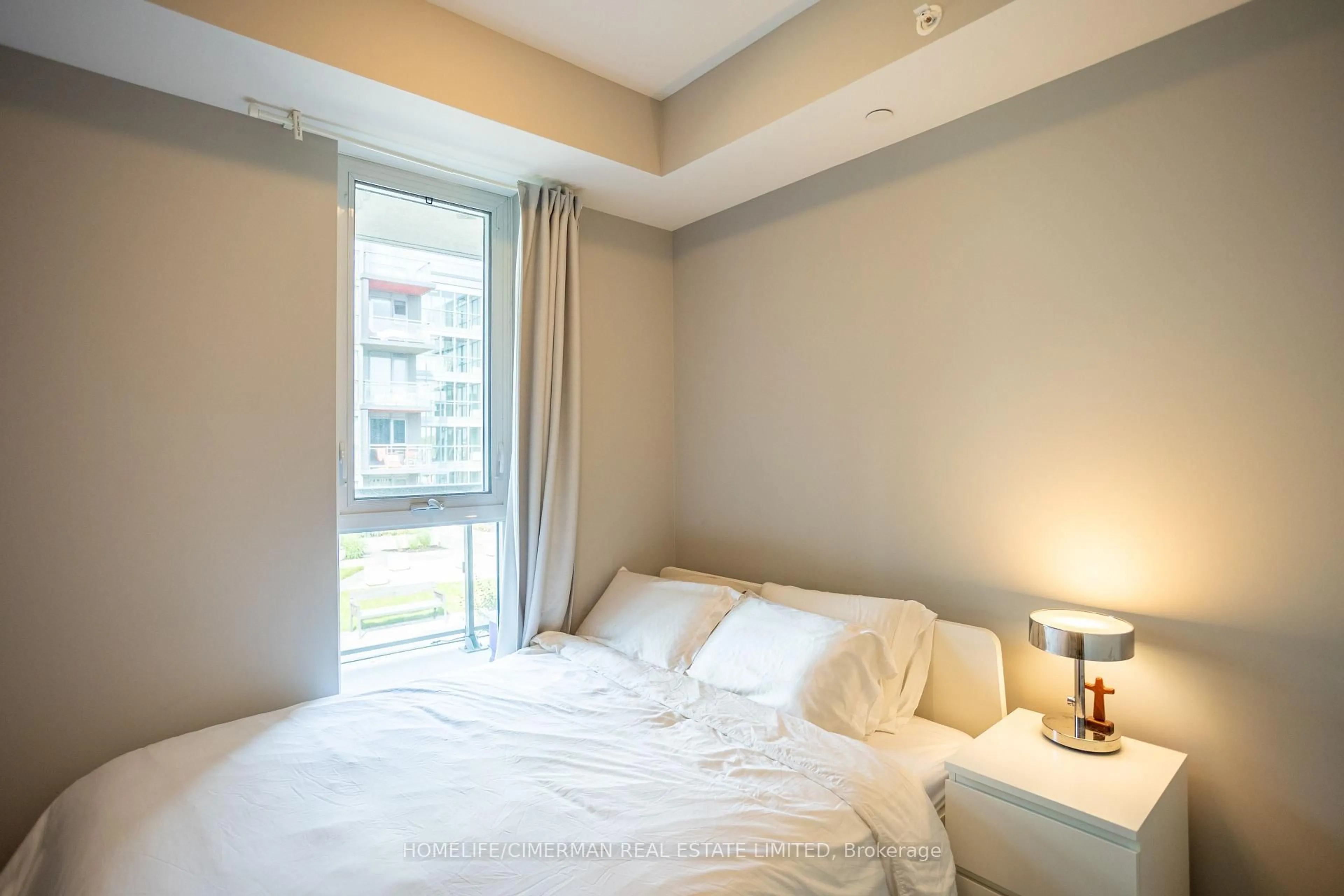 Bedroom with bed, unknown for 5260 Dundas St #C323, Burlington Ontario L7L 0J7
