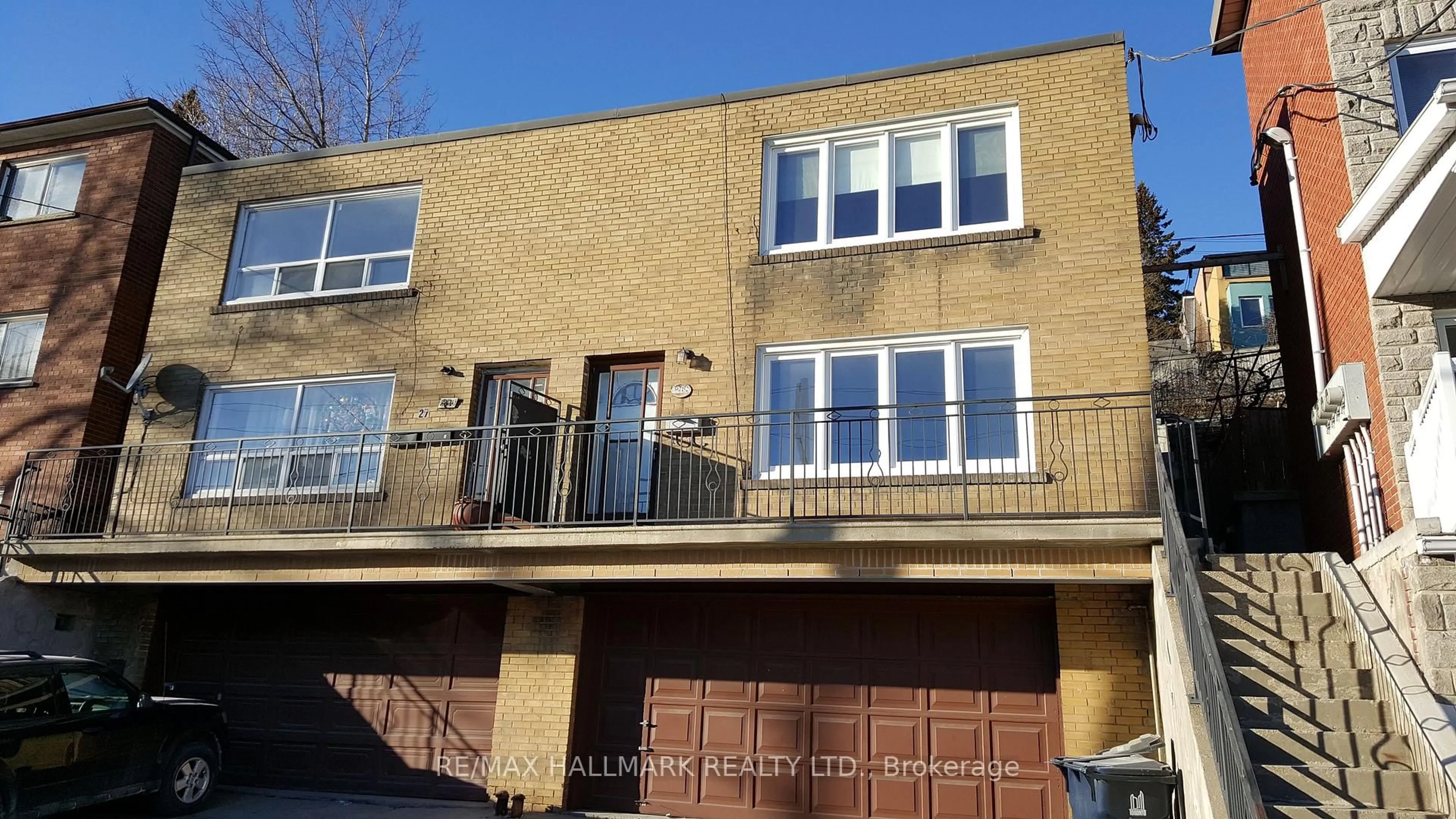 Home with brick exterior material, building for 1268 Davenport Rd, Toronto Ontario M6H 2G9