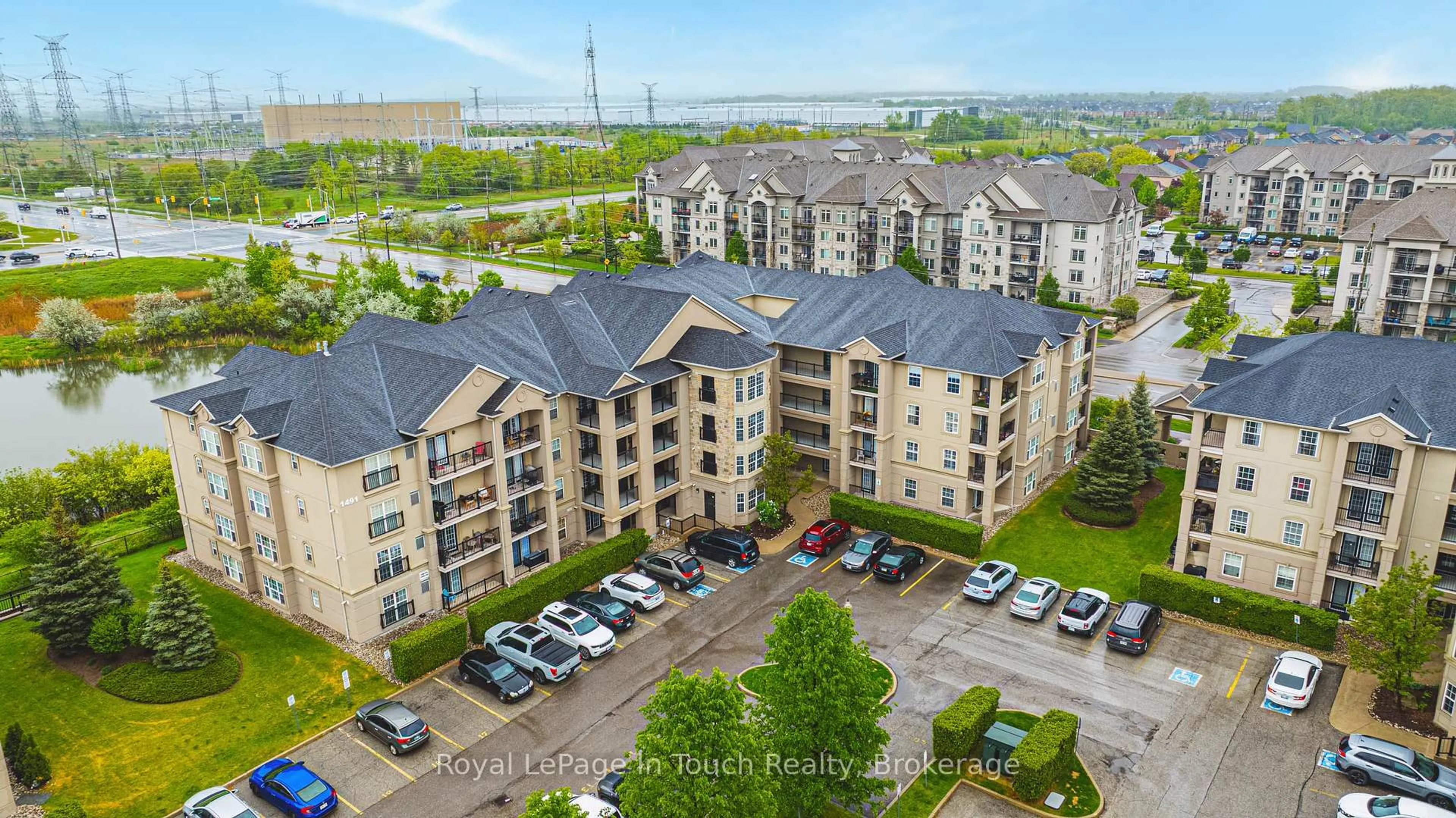 A pic from outside/outdoor area/front of a property/back of a property/a pic from drone, unknown for 1491 Maple Ave #311, Milton Ontario L9T 0B8