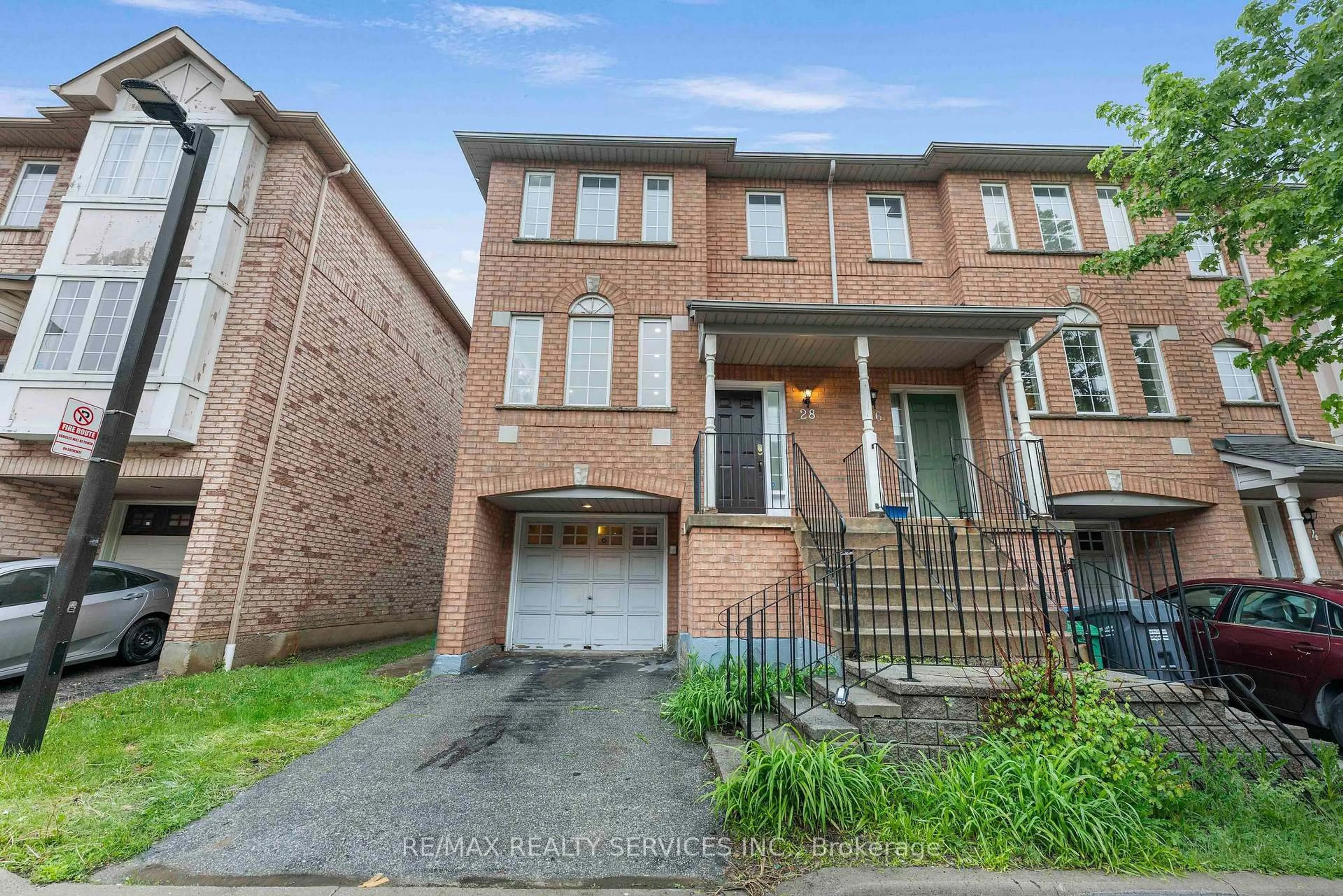 Home with brick exterior material, street for 80 Acorn Pl #28, Mississauga Ontario L4Z 4C9