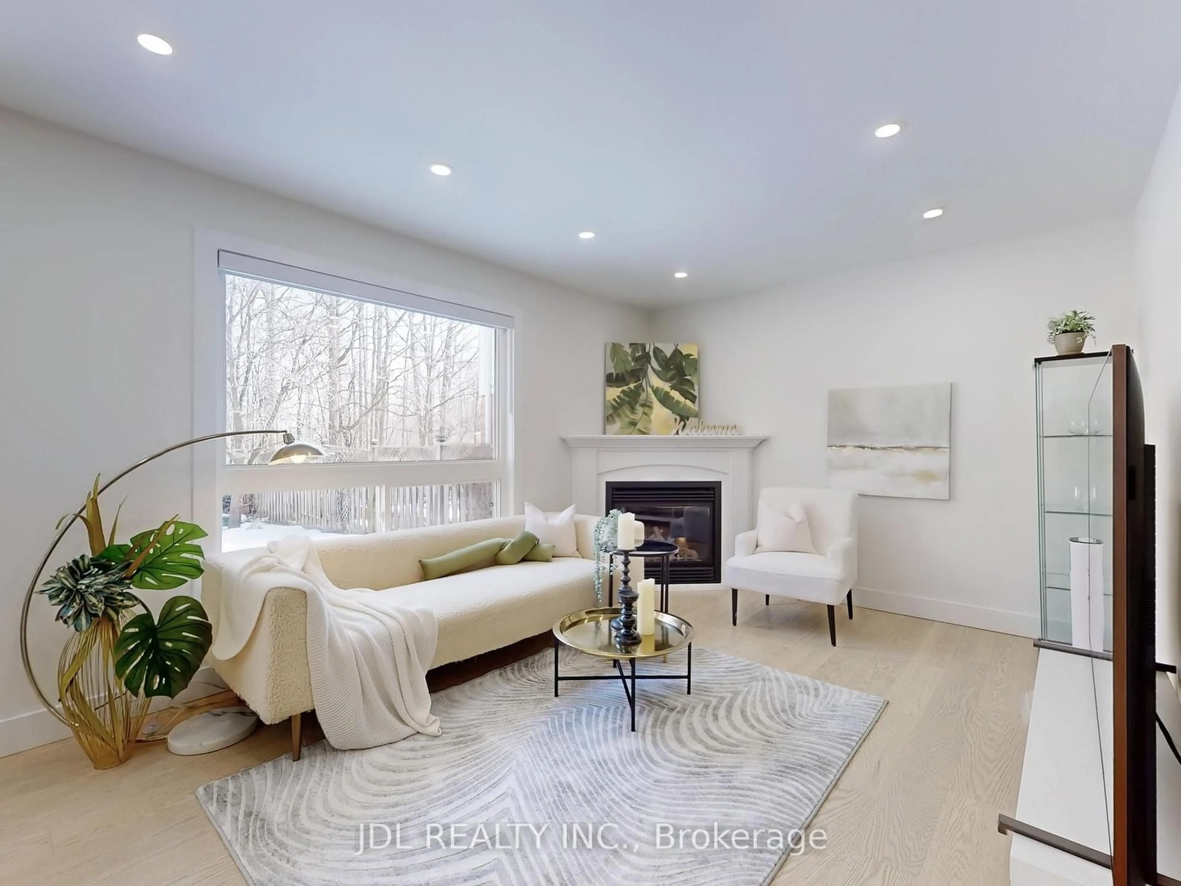 Living room with furniture, wood/laminate floor for 1043 Freeman Tr, Milton Ontario L9T 5T3