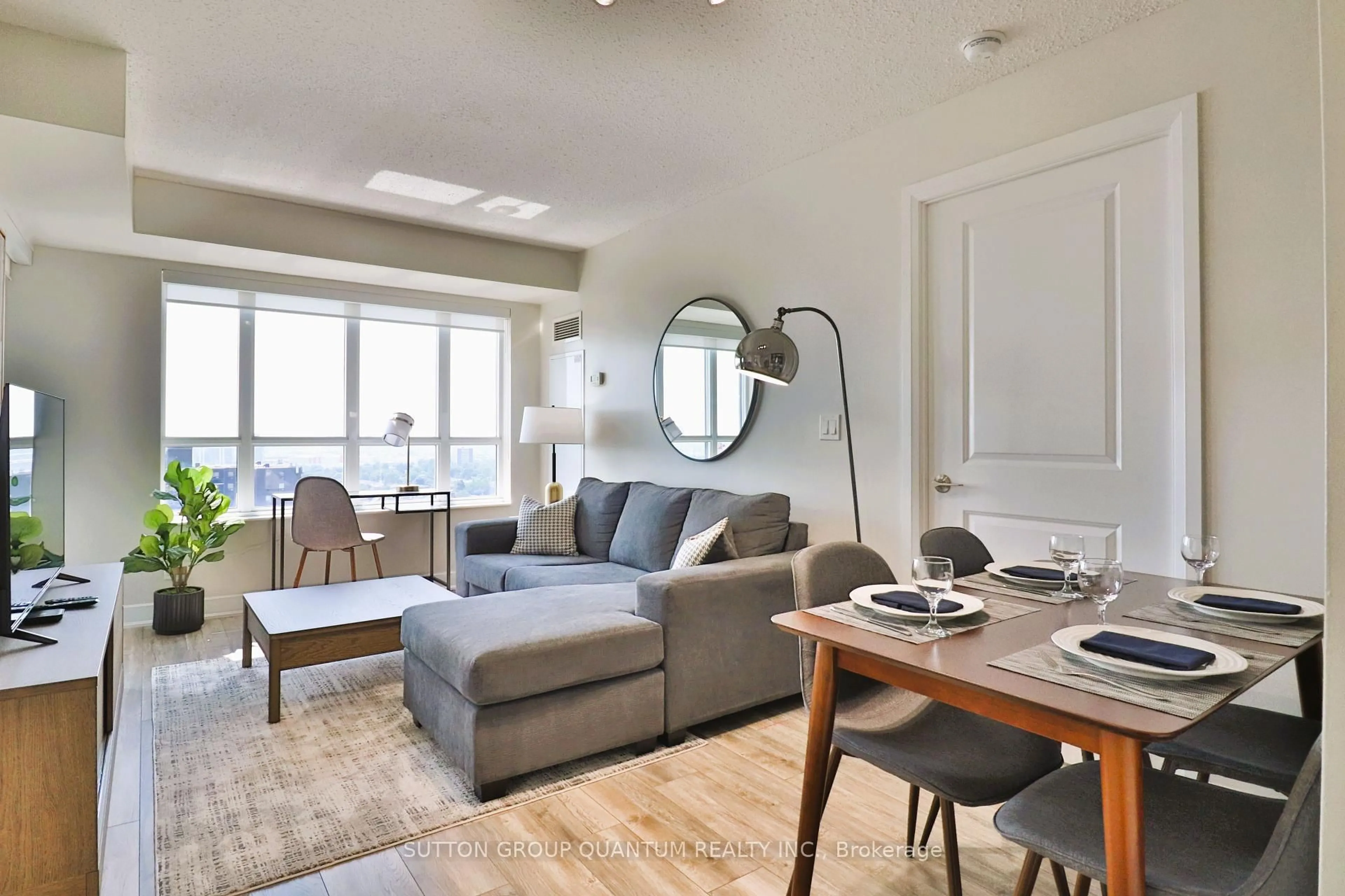 Living room with furniture, unknown for 6 Eva Rd #1807, Toronto Ontario M9C 0B1