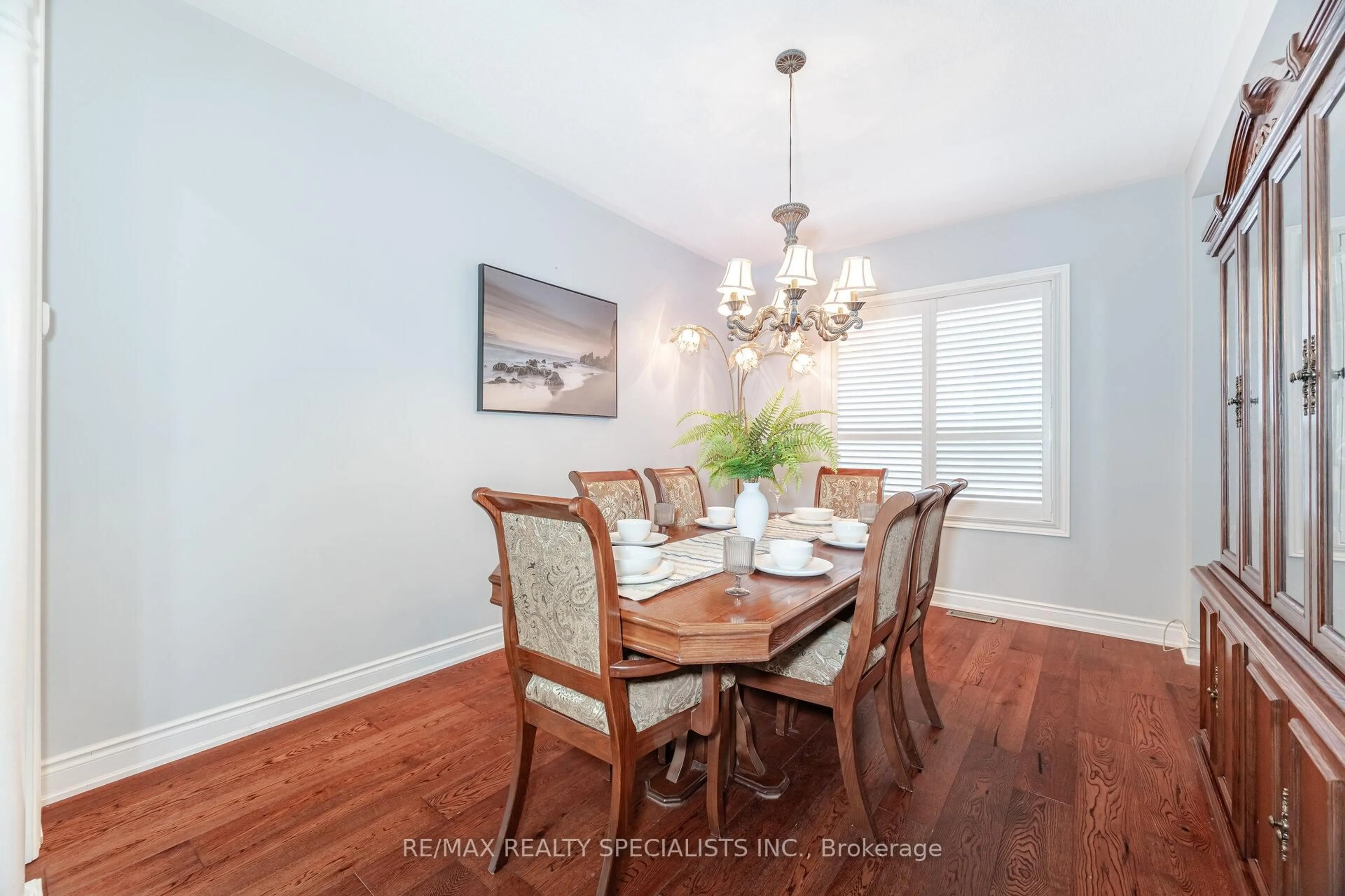 Dining room, wood/laminate floor for 8 Goreridge Cres, Brampton Ontario L6P 1P2