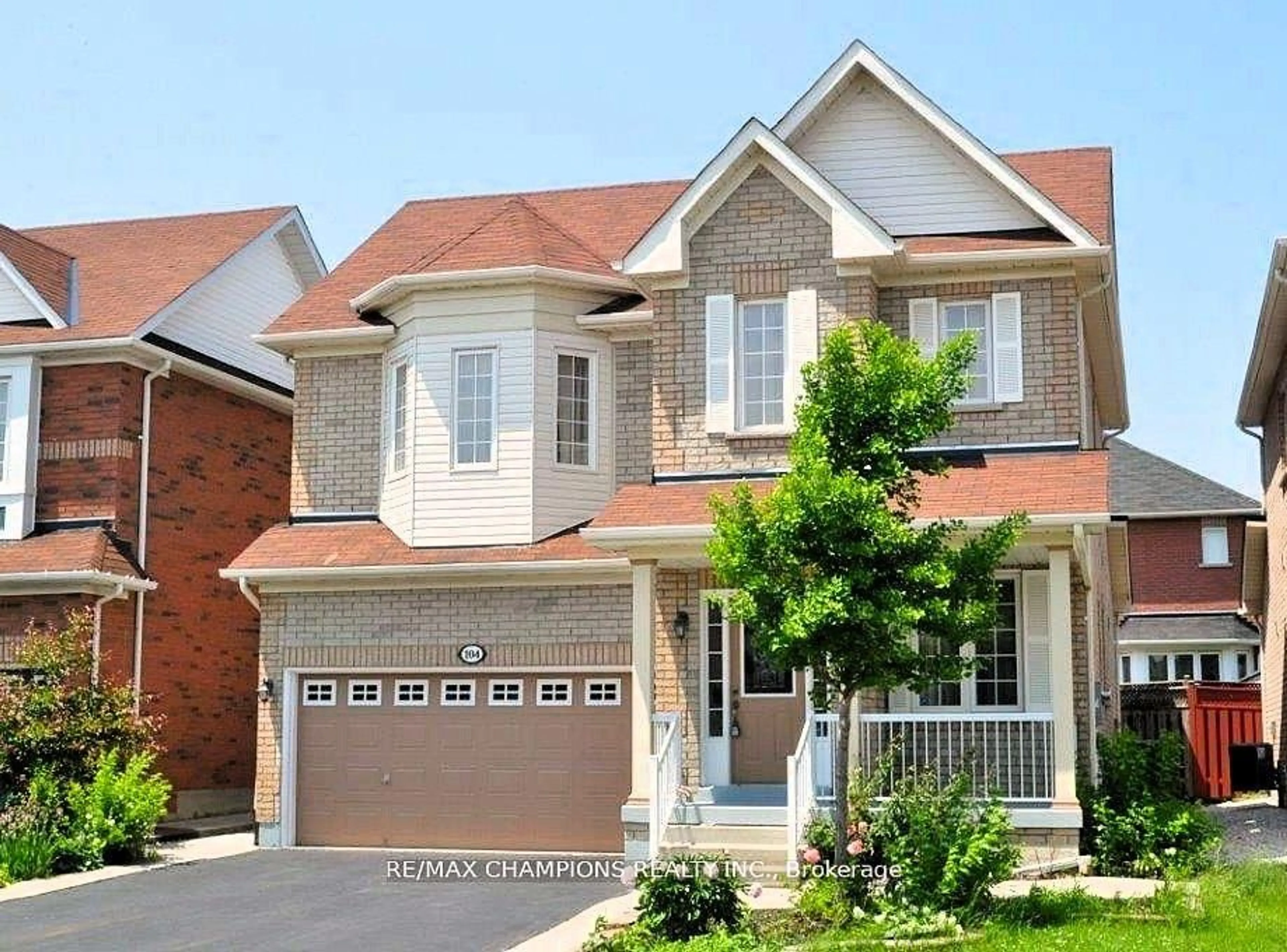 Home with brick exterior material, street for 104 Masters Green Cres, Brampton Ontario L7A 3K2