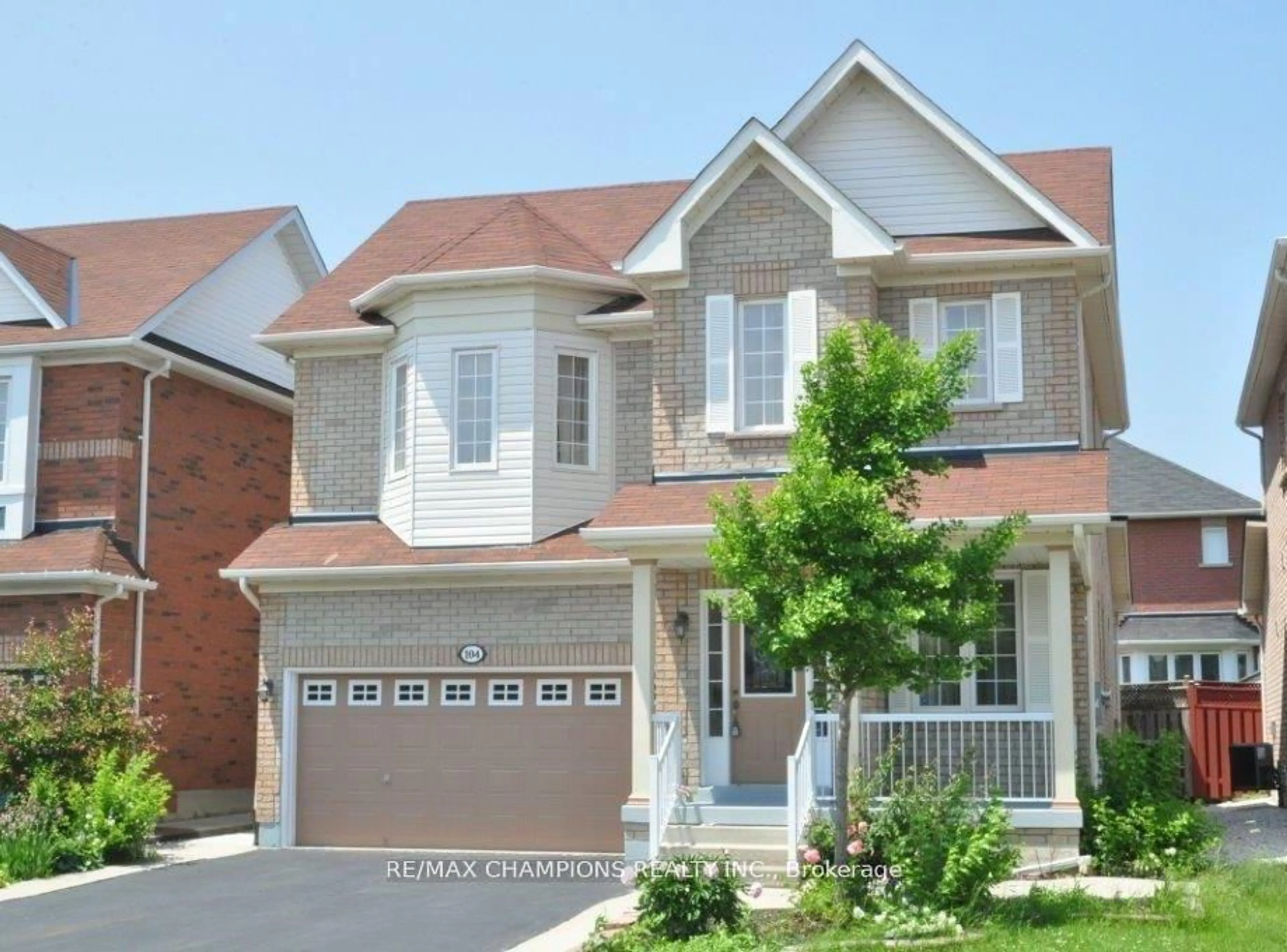 Home with brick exterior material, street for 104 Masters Green Cres, Brampton Ontario L7A 3K2