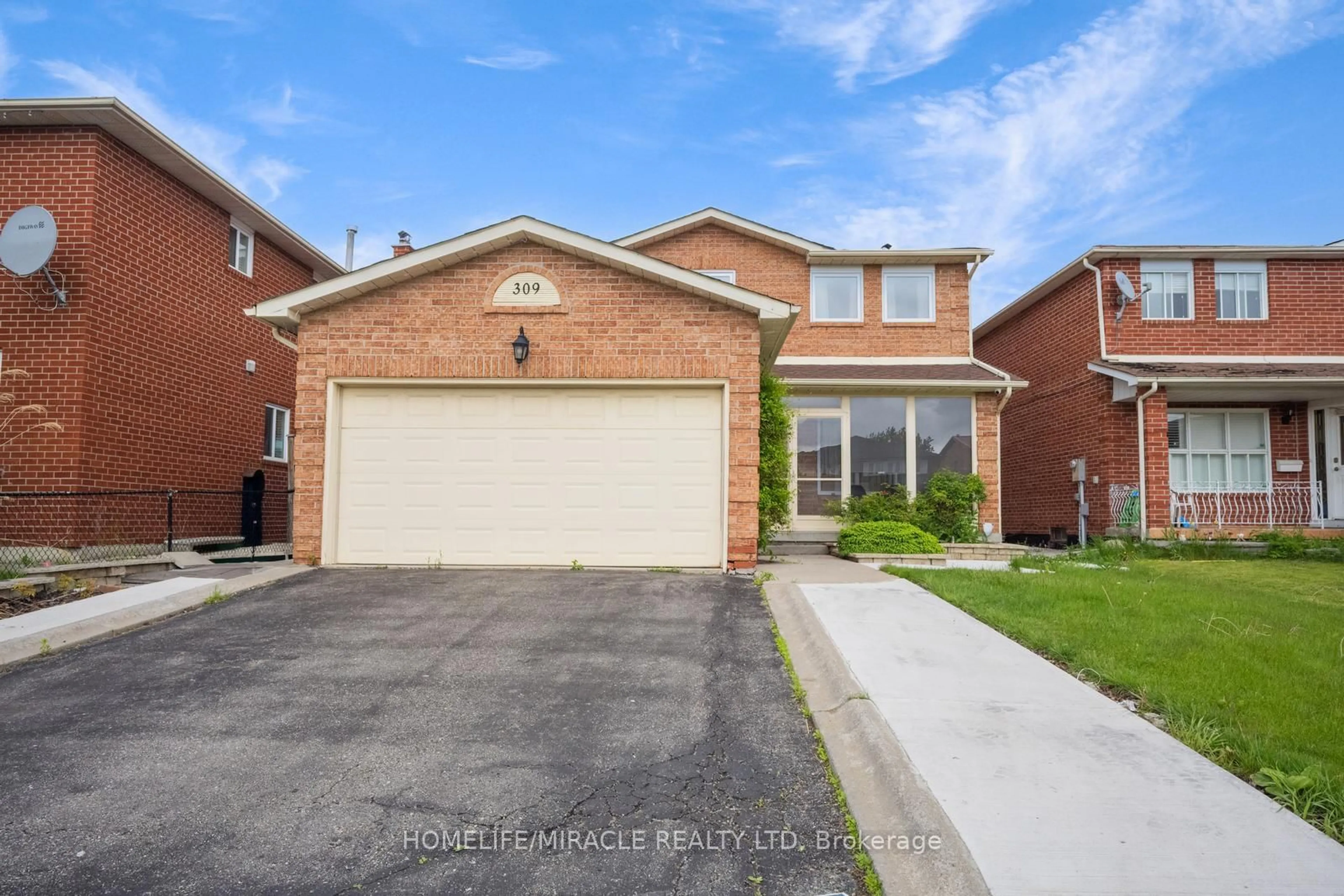 Home with brick exterior material, street for 309 Conestoga Dr, Brampton Ontario L6Z 2T4