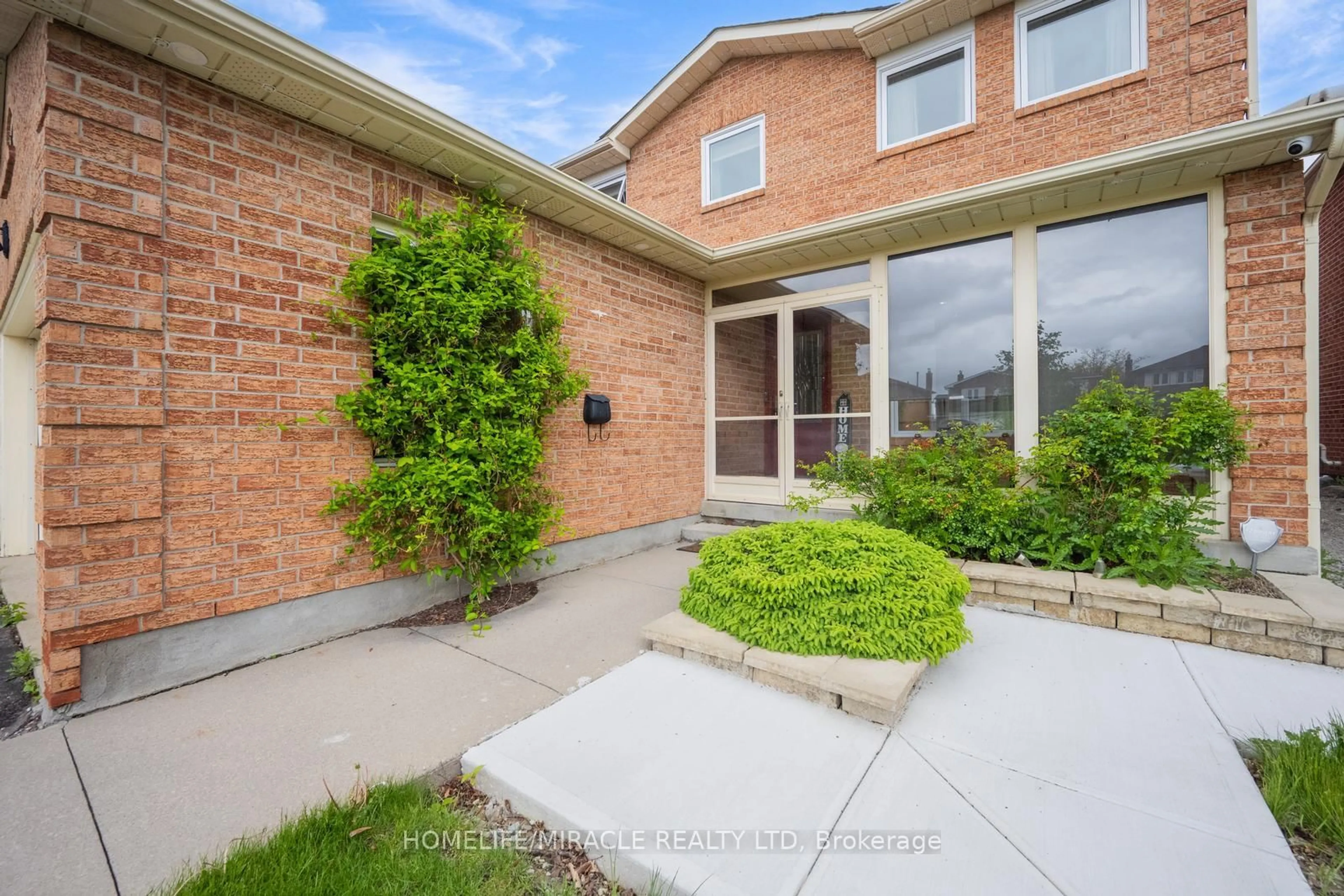 Home with brick exterior material, street for 309 Conestoga Dr, Brampton Ontario L6Z 2T4
