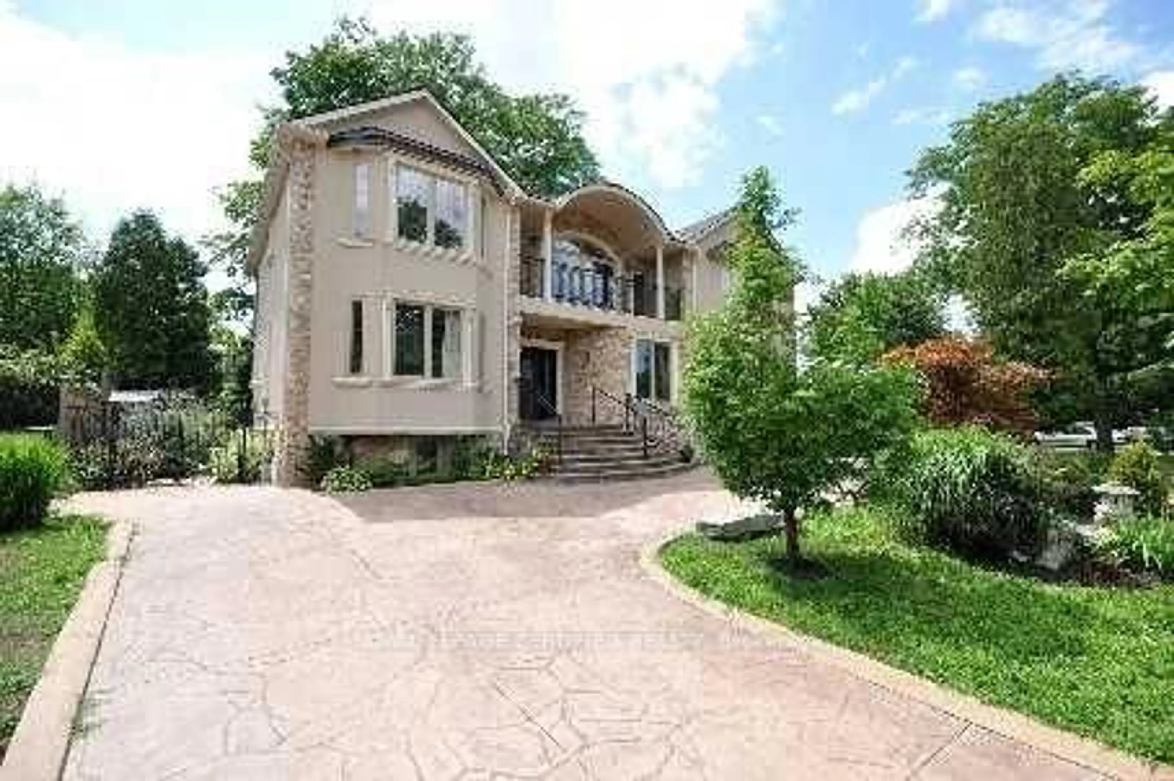 Home with brick exterior material, street for 12 Pioneer Dr, Mississauga Ontario L5M 1G9