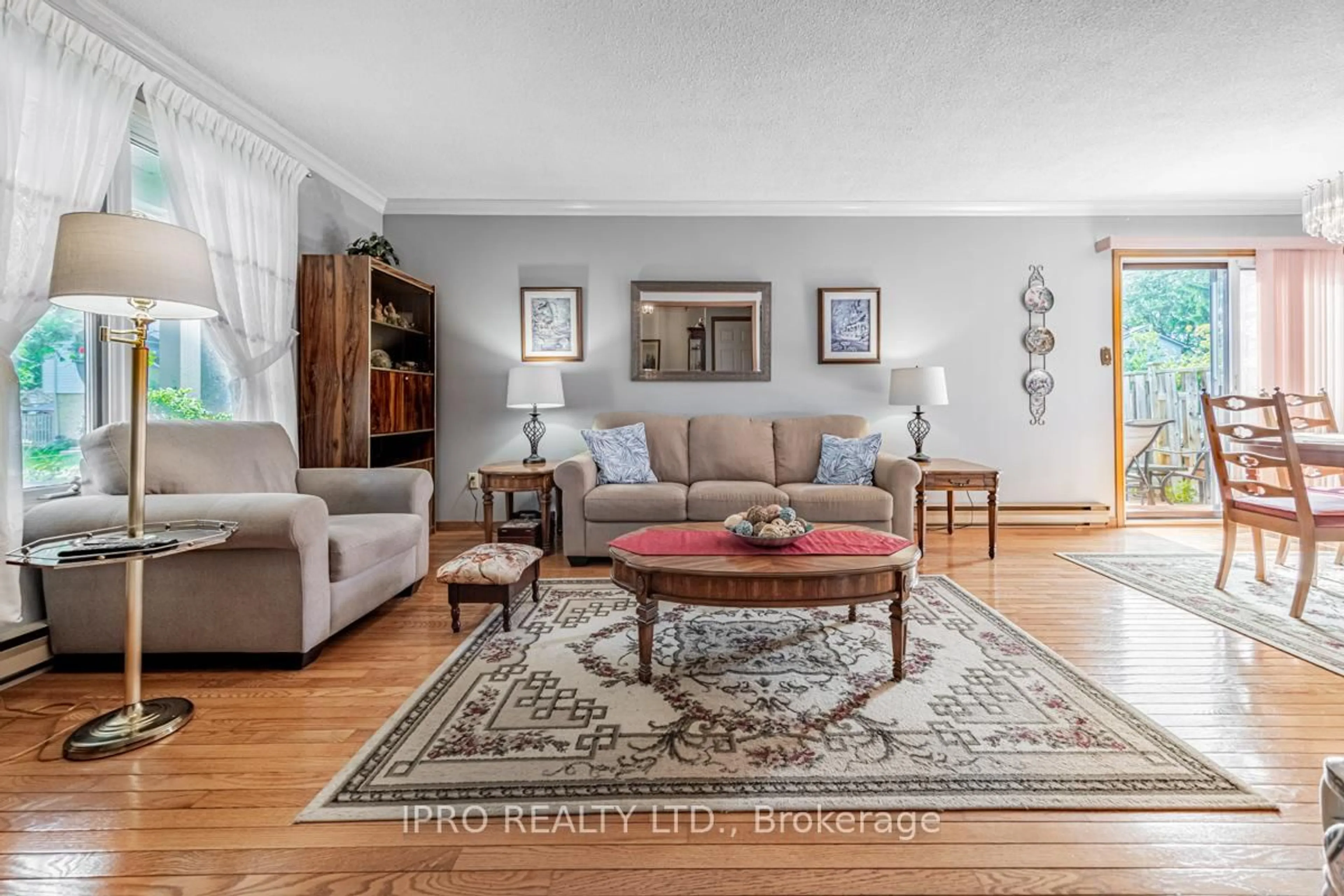 Living room with furniture, unknown for 6540 Falconer Dr #124, Mississauga Ontario L5N 1M1