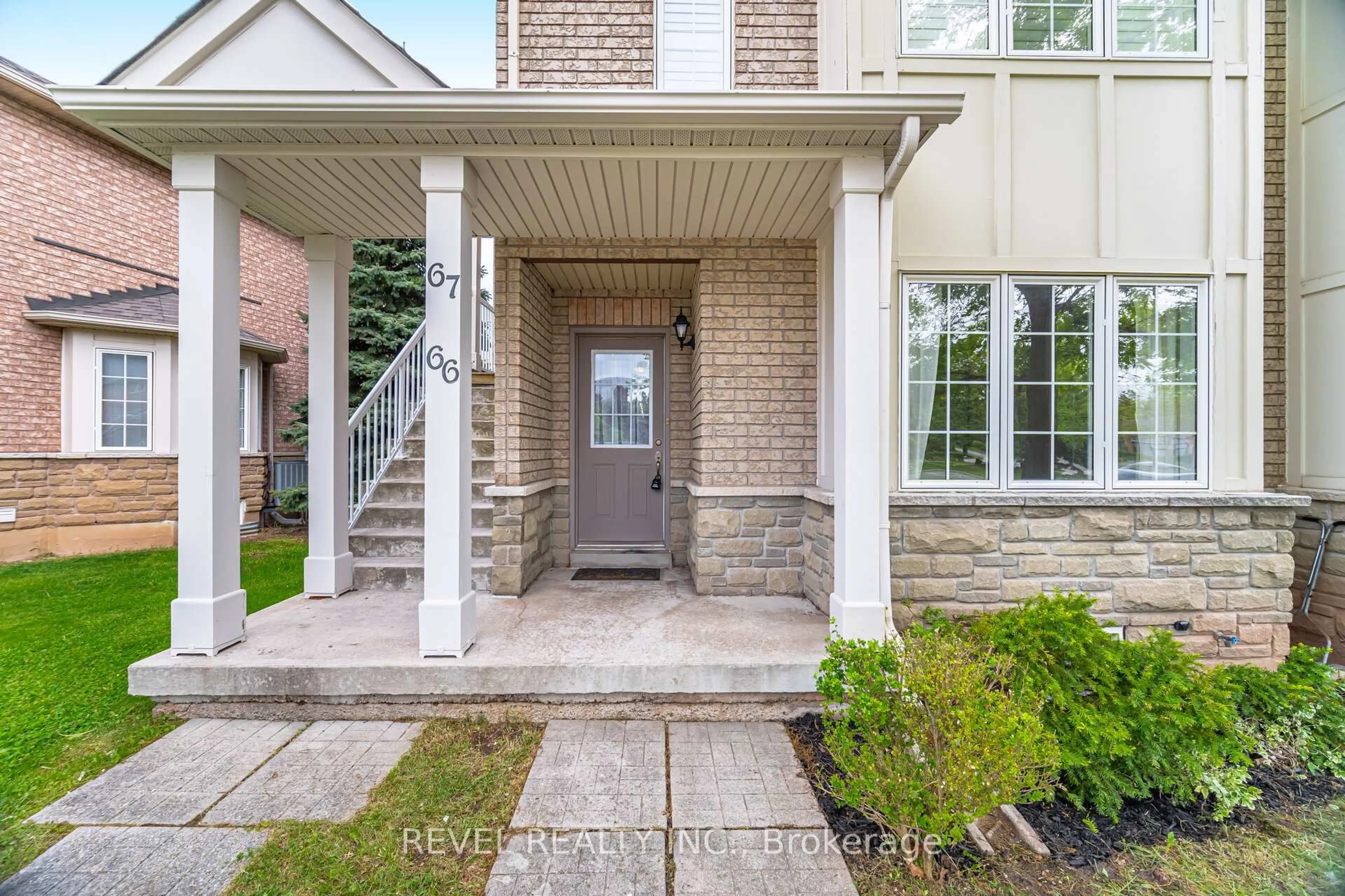 Home with brick exterior material, street for 1489 Heritage Way #66, Oakville Ontario L6M 4M7