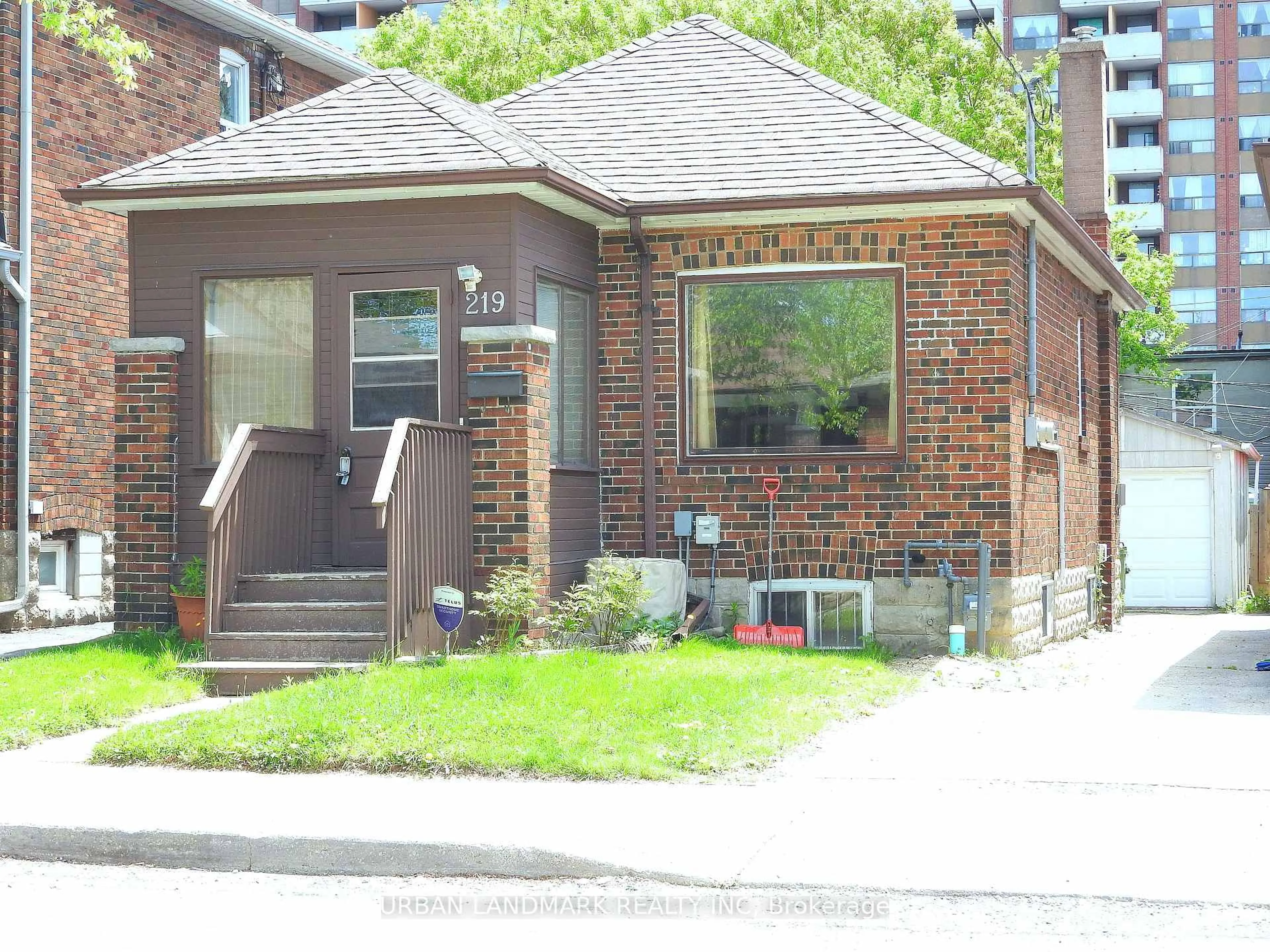 Home with brick exterior material, street for 219 Livingstone Ave, Toronto Ontario M6E 2M3