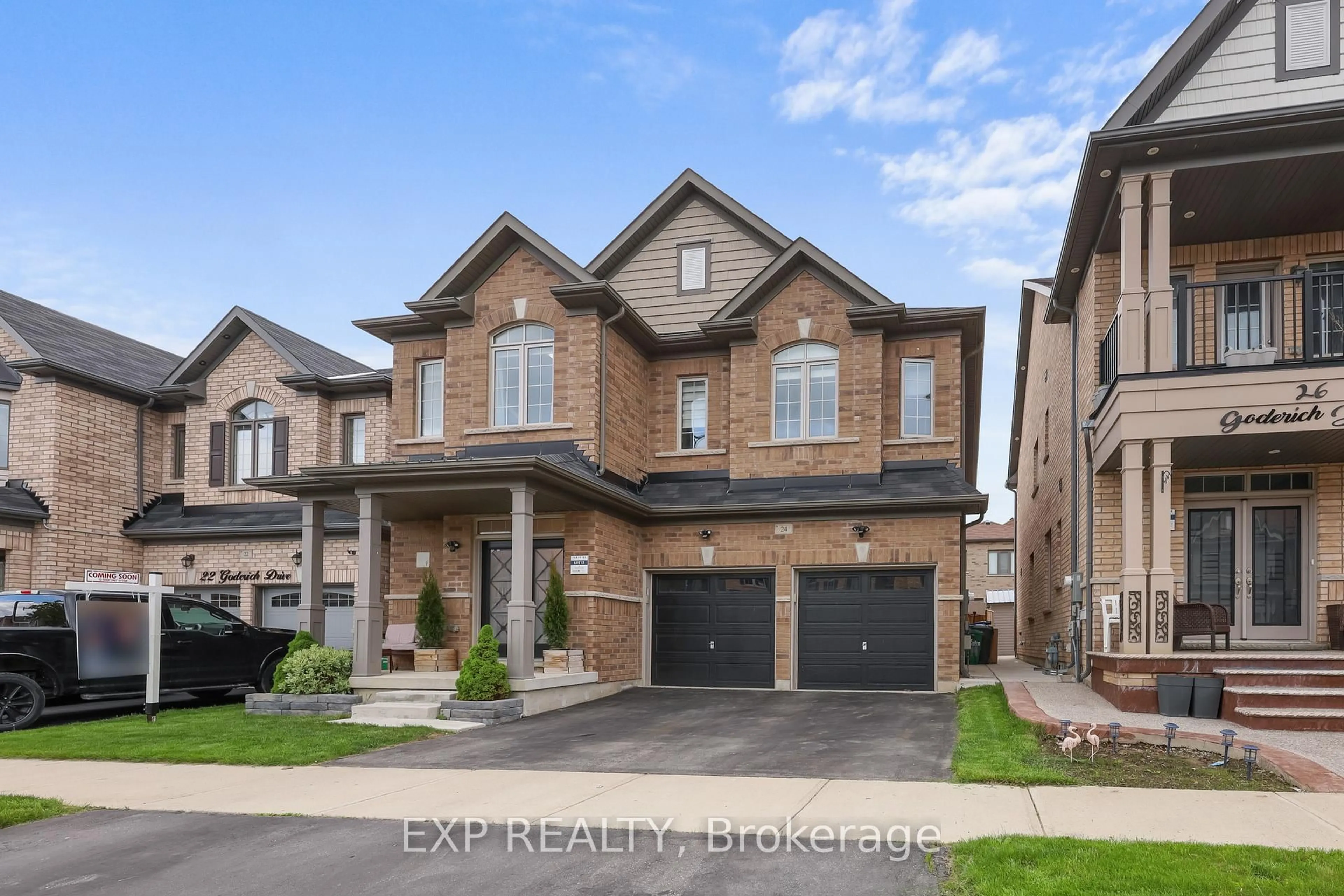 Home with brick exterior material, street for 24 Goderich Dr, Brampton Ontario L7A 5A7