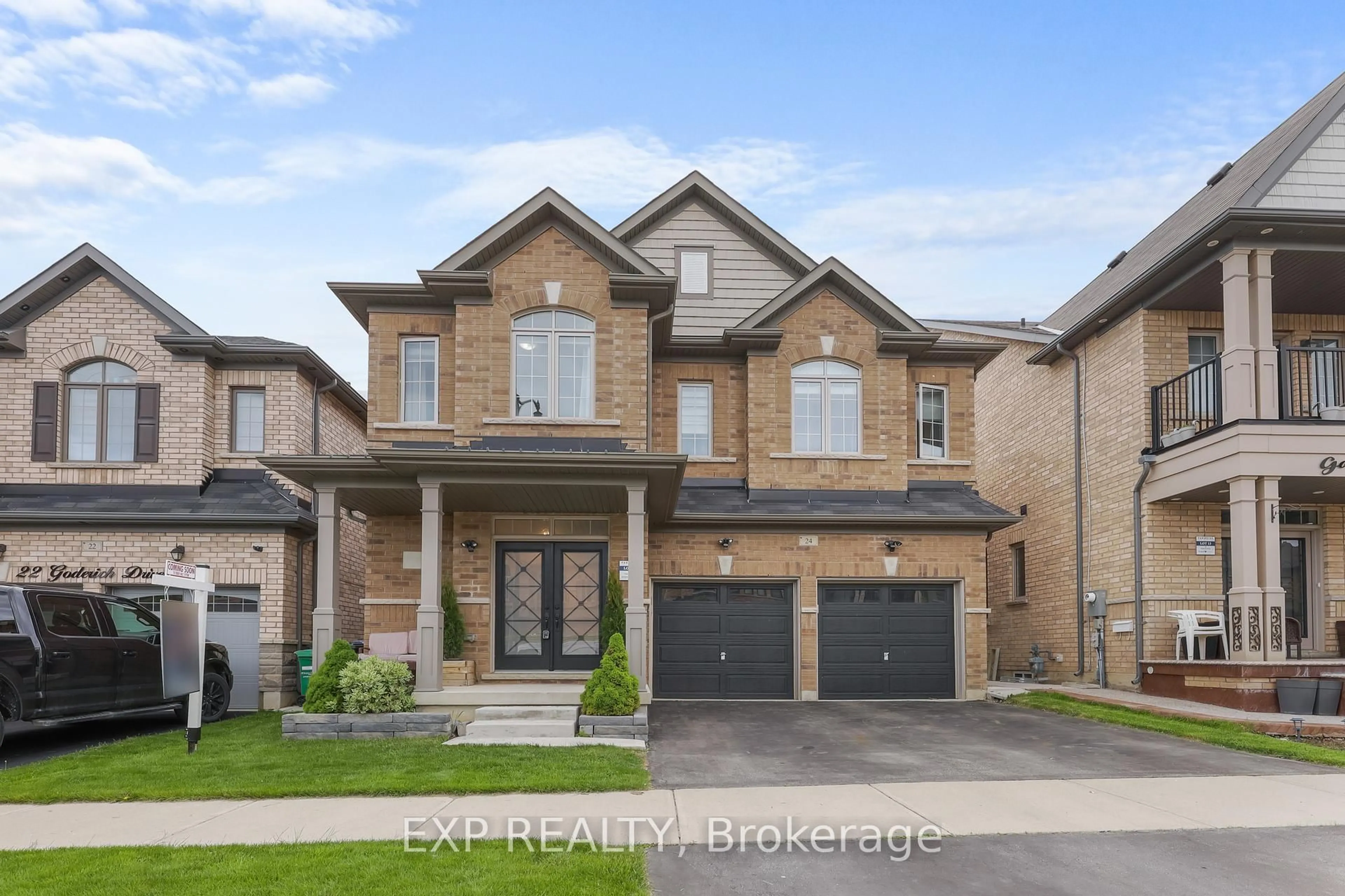 Home with brick exterior material, street for 24 Goderich Dr, Brampton Ontario L7A 5A7