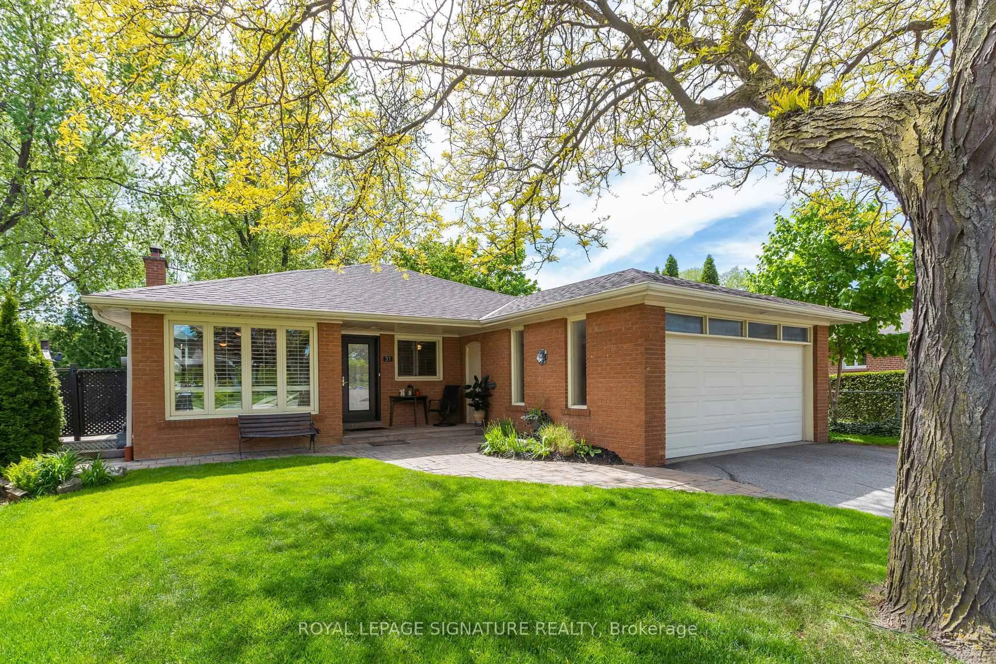 Home with brick exterior material, street for 31 Norbert Cres, Toronto Ontario M9C 3J8
