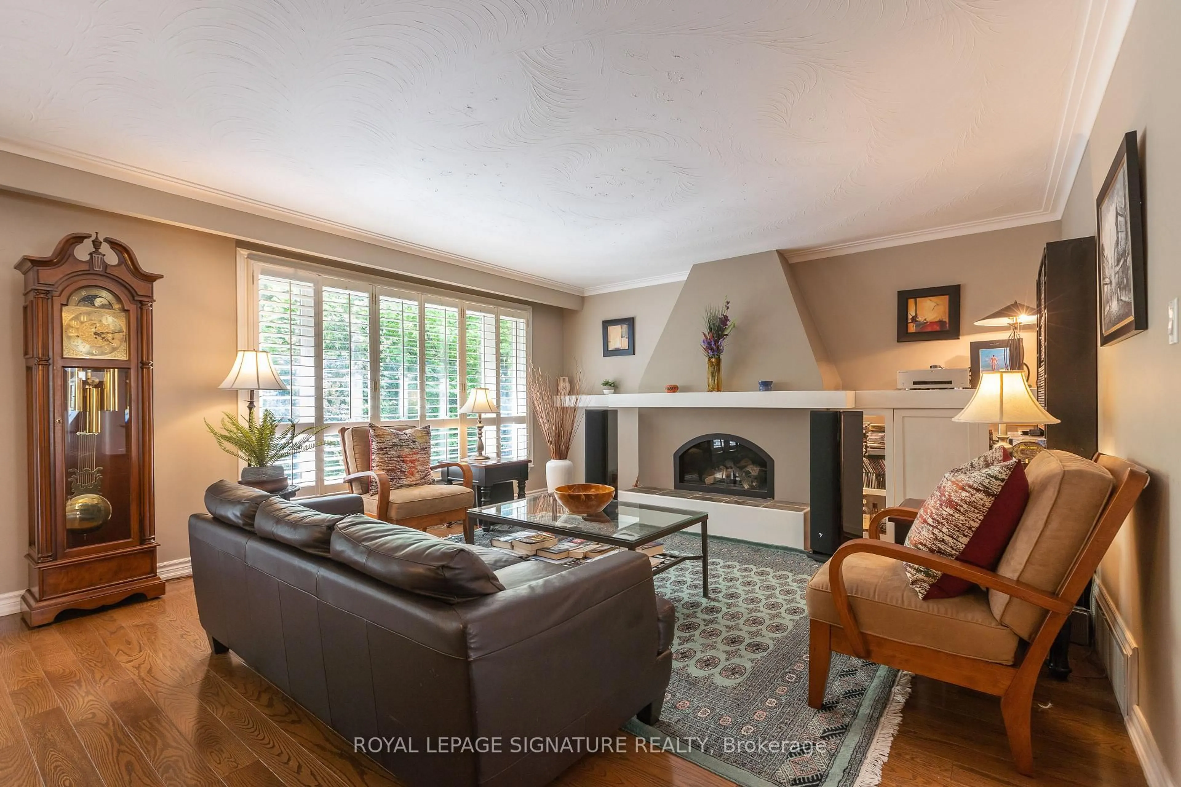 Living room with furniture, wood/laminate floor for 31 Norbert Cres, Toronto Ontario M9C 3J8