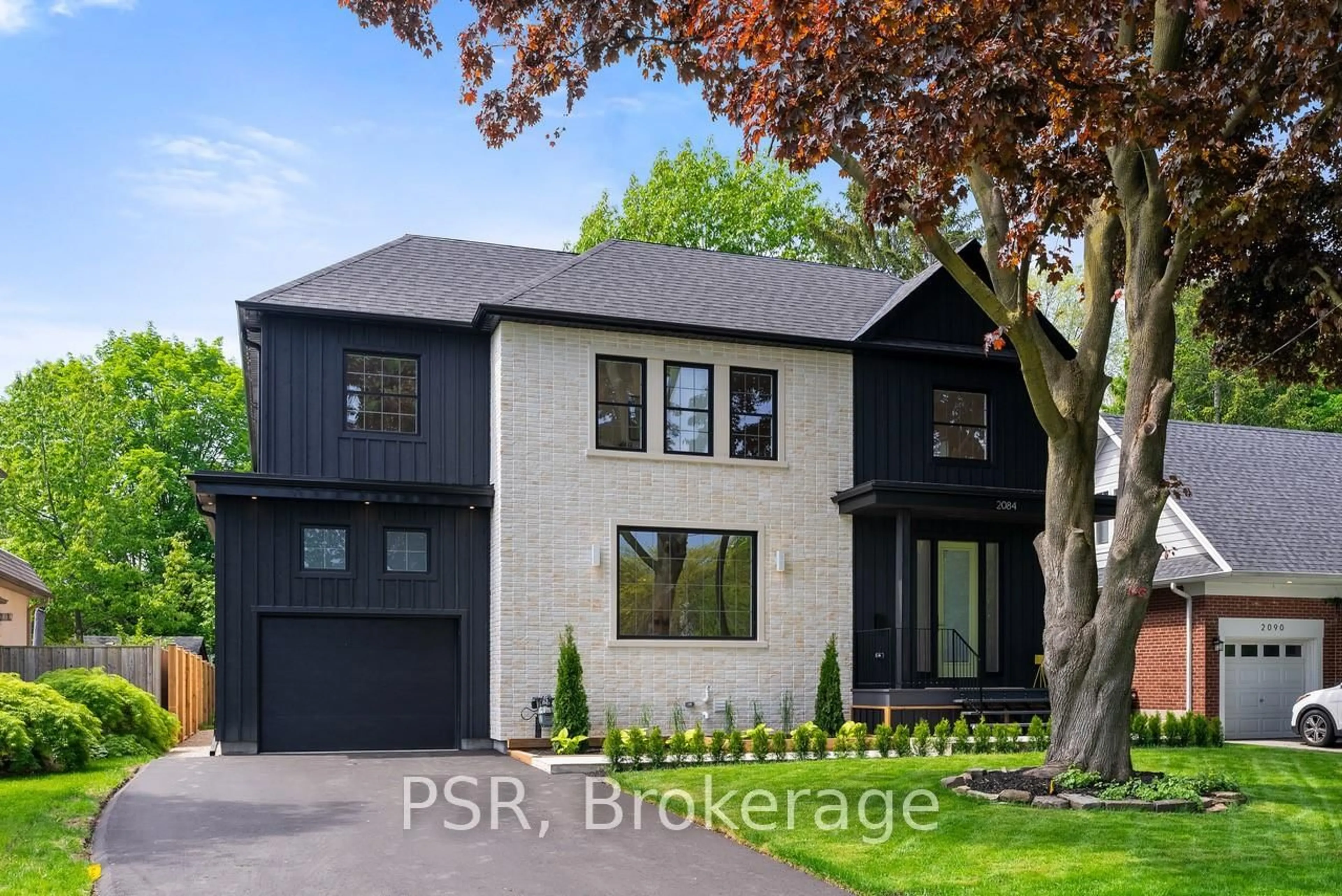Home with brick exterior material, street for 2084 Tolman Rd, Mississauga Ontario L4Y 1S9