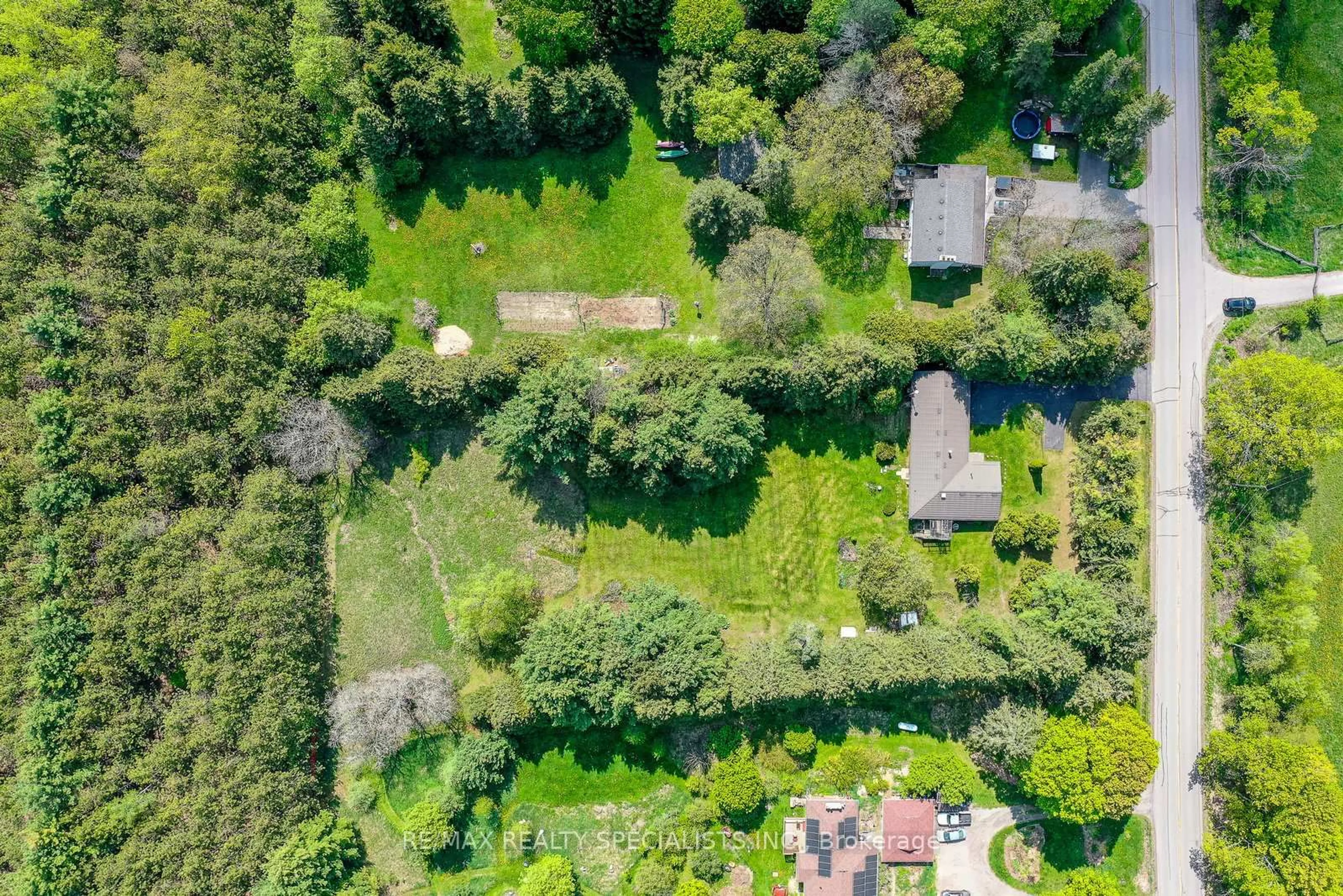 A pic from outside/outdoor area/front of a property/back of a property/a pic from drone, forest/trees view for 15775 Duffys Lane #On, Caledon Ontario L7E 3C8