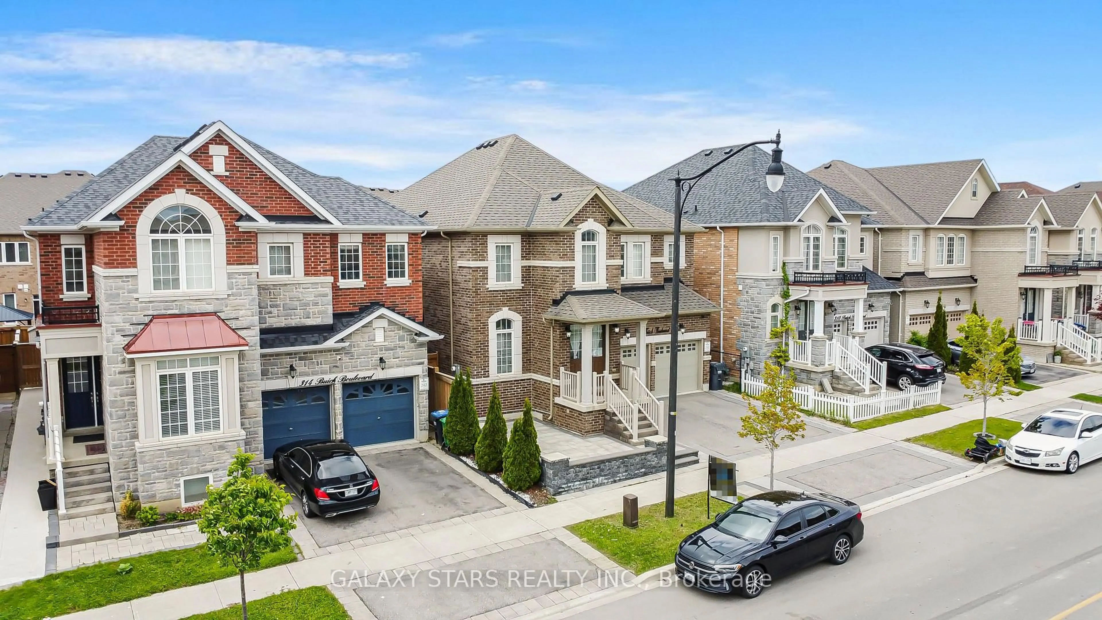 A pic from outside/outdoor area/front of a property/back of a property/a pic from drone, street for 312 Buick Blvd, Brampton Ontario L7A 4L8