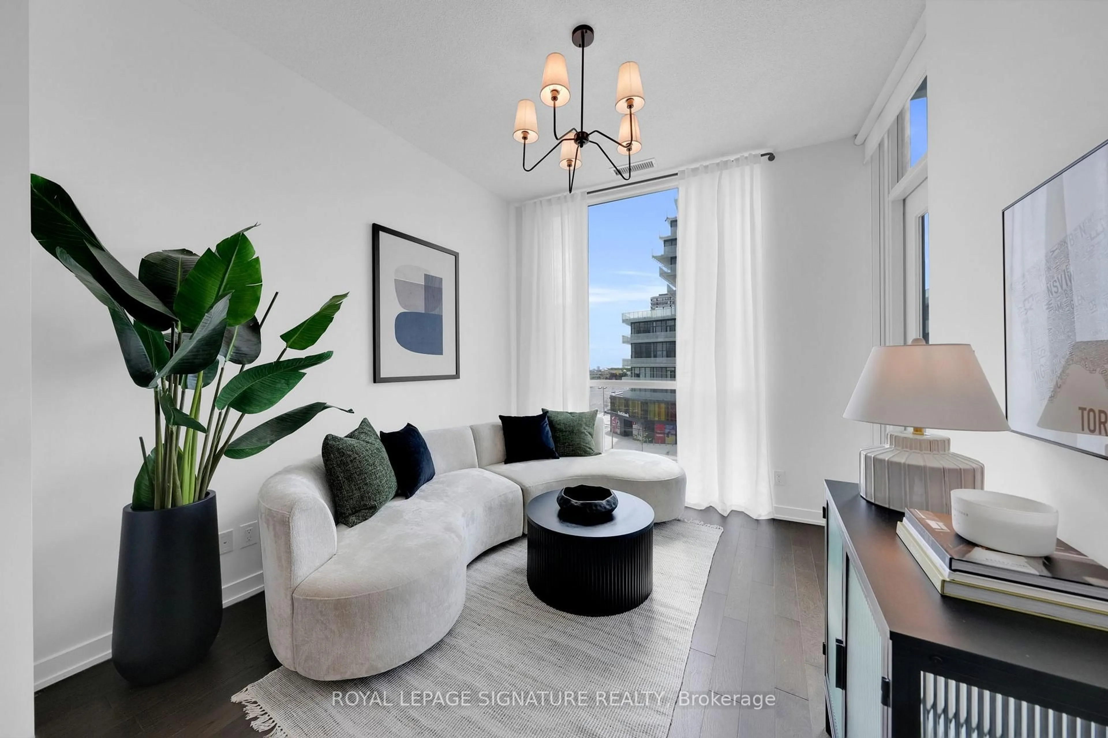 Living room with furniture, unknown for 4011 Brickstone Mews #312, Mississauga Ontario L5B 0G3