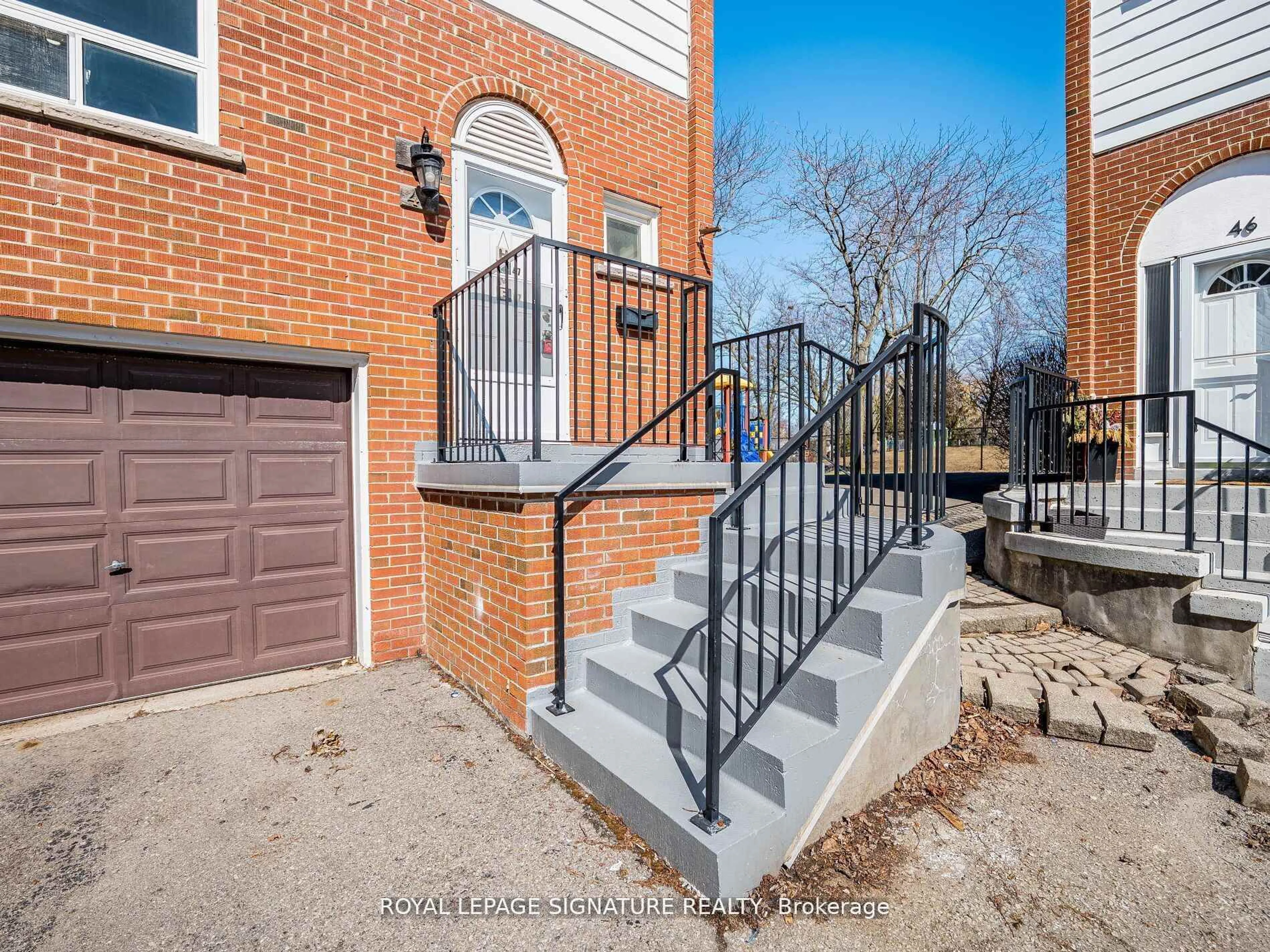 Home with brick exterior material, street for 2445 Homelands Ave #47, Mississauga Ontario L5K 2C6