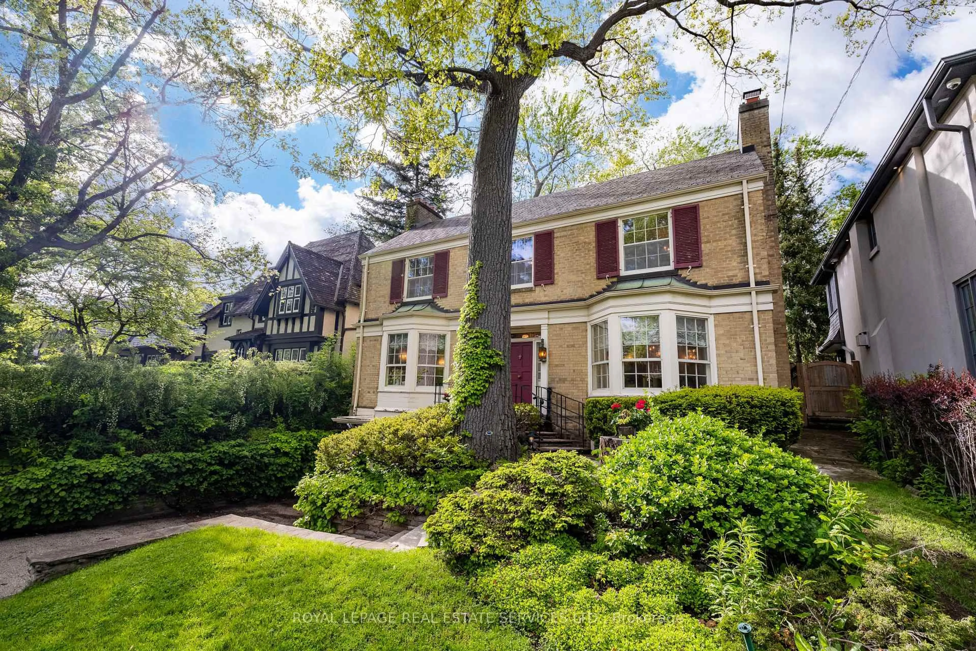 Home with brick exterior material, street for 12 Queen Marys Dr, Toronto Ontario M8X 1S2