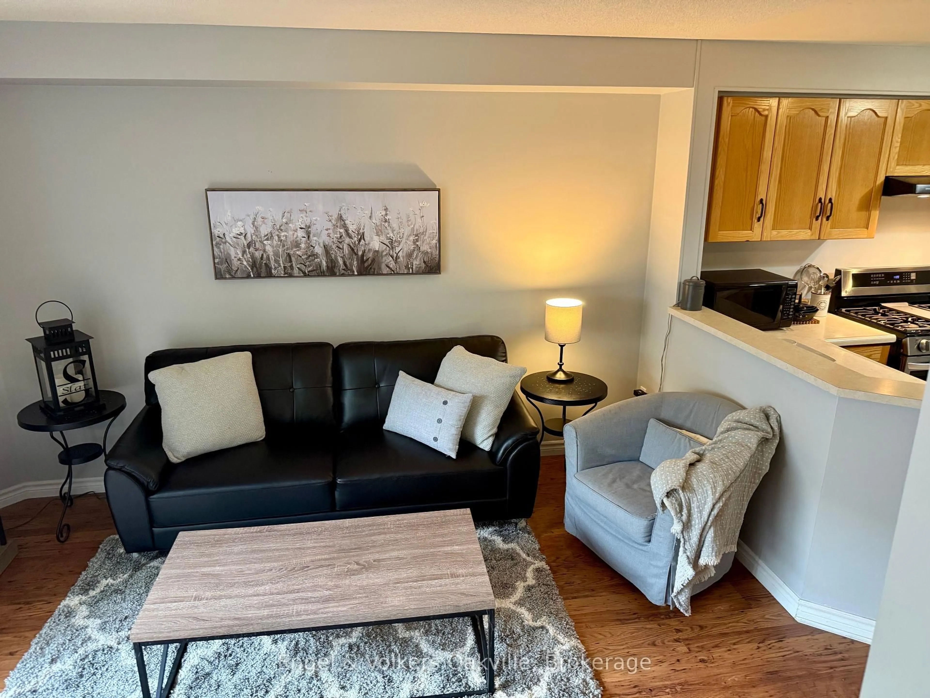 Living room with furniture, wood/laminate floor for 2015 Cleaver Ave #15, Burlington Ontario L7M 4J7