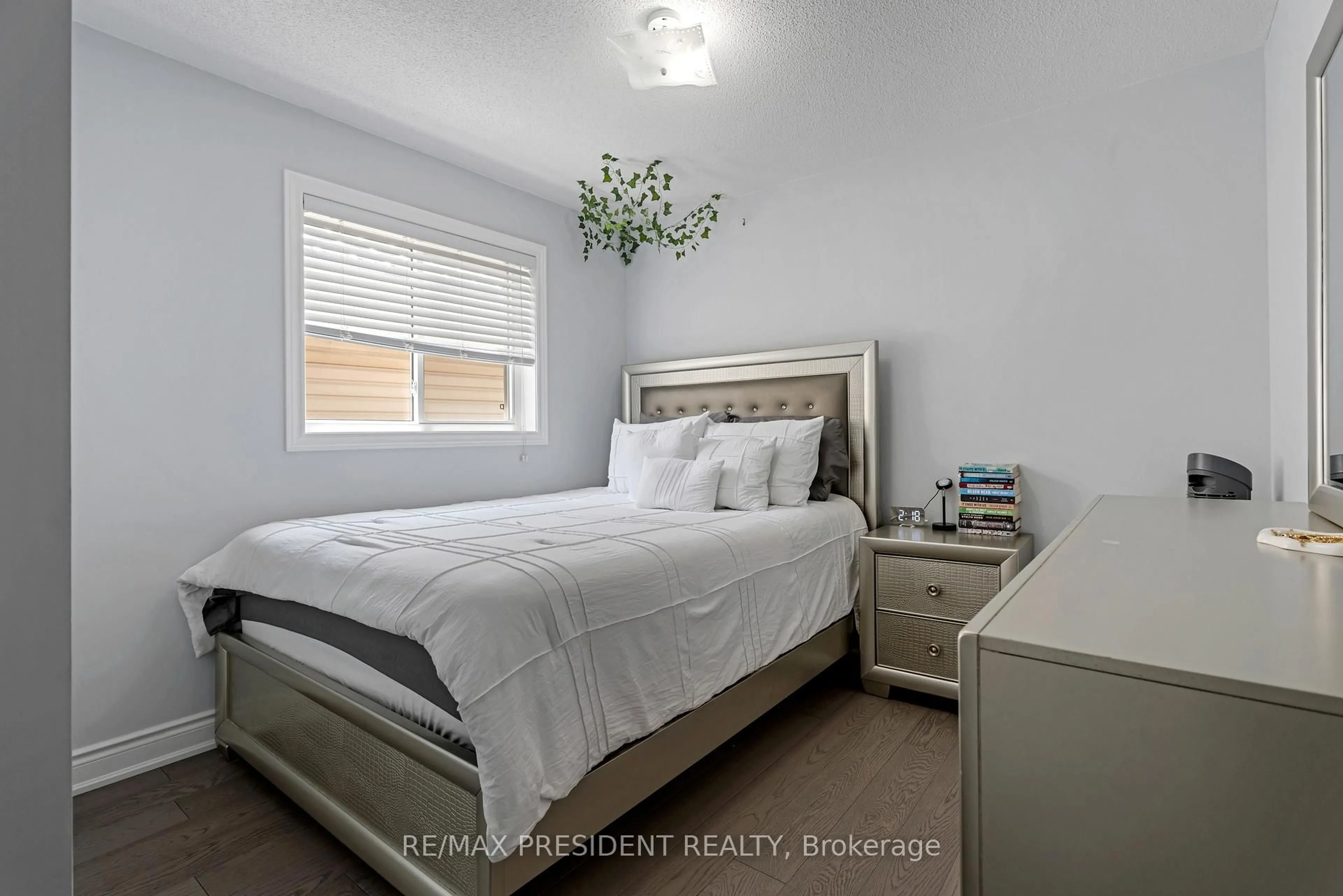 Bedroom with bed, wood/laminate floor for 5209 Danielle Dr, Burlington Ontario L7L 7L1