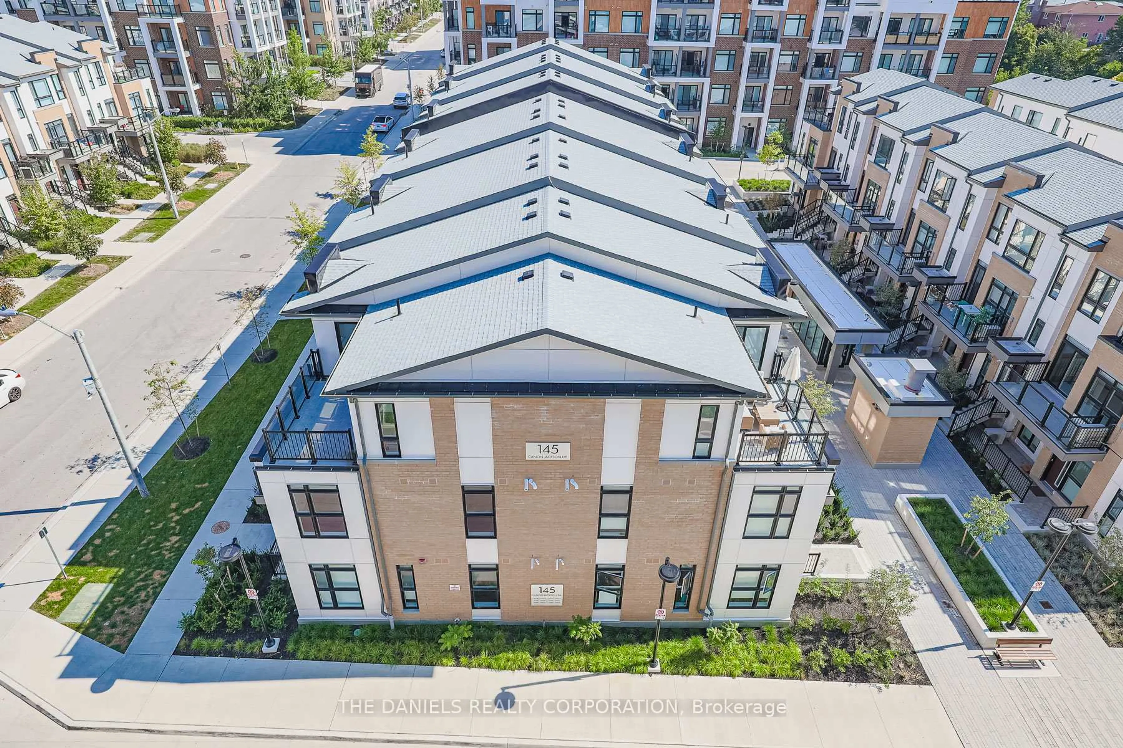 A pic from outside/outdoor area/front of a property/back of a property/a pic from drone, city buildings view from balcony for 145 Canon Jackson Dr #109, Toronto Ontario M6M 0E1