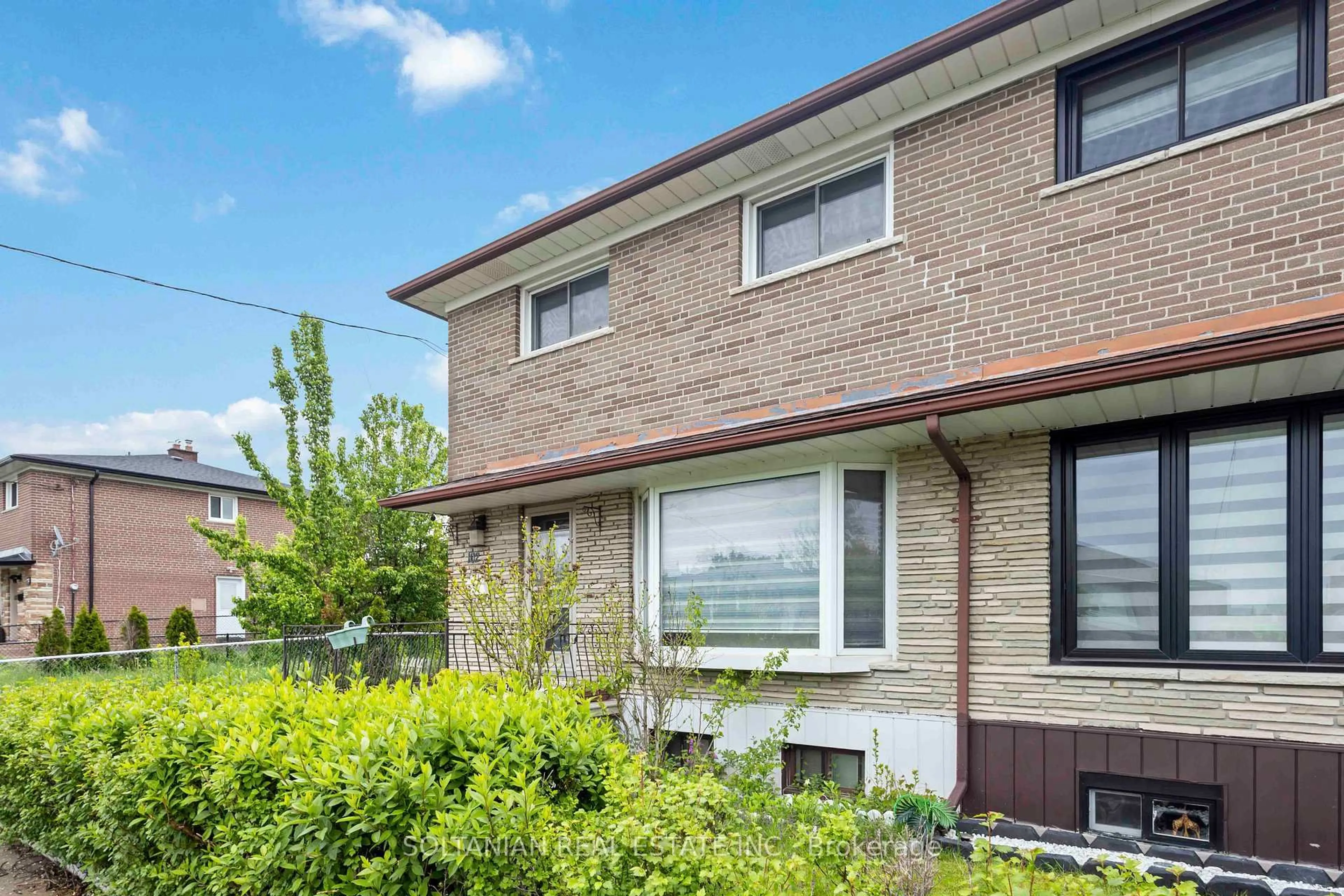 Home with brick exterior material, street for 102 Elnathan Cres, Toronto Ontario M9L 2G1