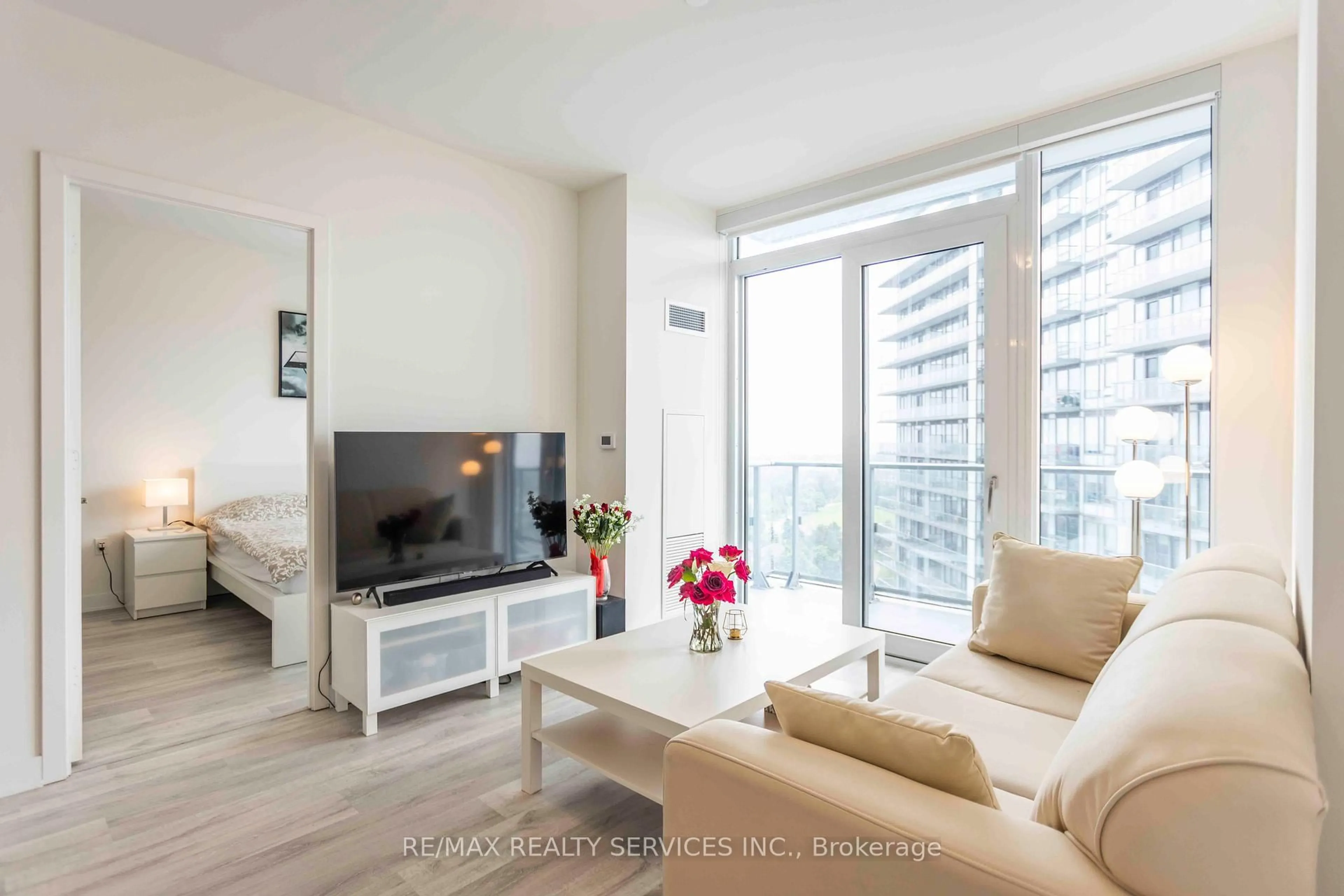 Living room with furniture, wood/laminate floor for 4675 Metcalfe Ave #1106, Mississauga Ontario L5M 0Z8
