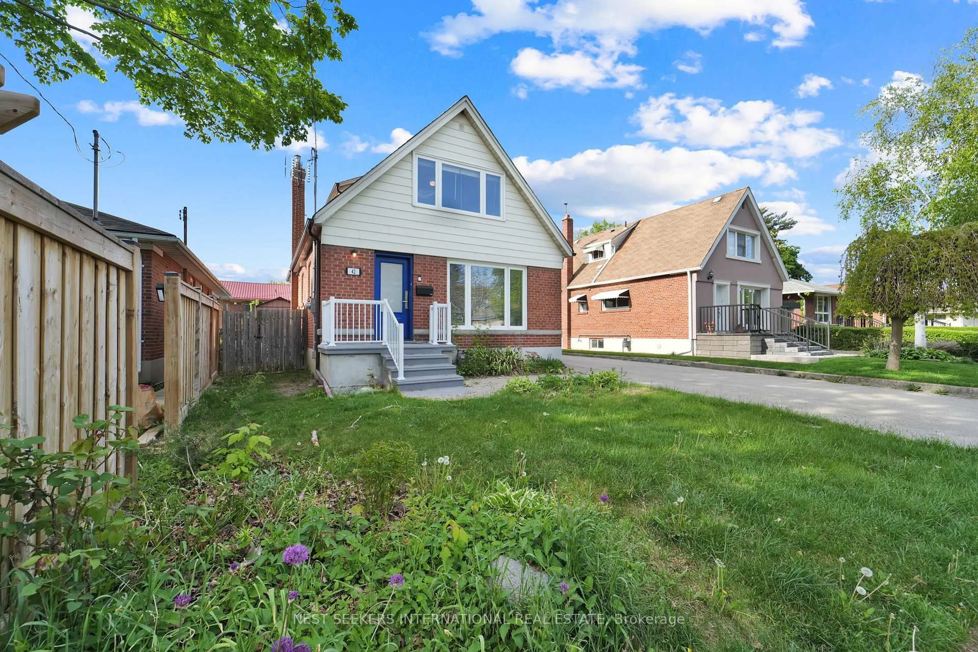 Home with brick exterior material, street for 42 Fordwich Cres, Toronto Ontario M9W 2T4